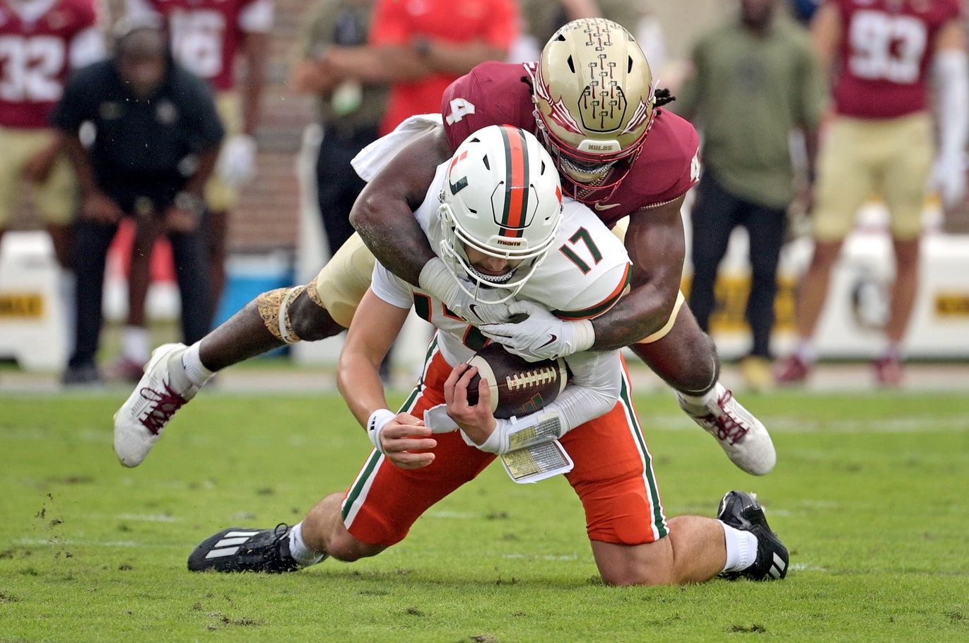 Florida State Seminoles linebacker Kalen Deloach (4) sacks Miami Hurricanes quarterback Emory Williams (17) during the first quarter at Doak S. Campbell Stadium. Mandatory Credit: Melina Myers-USA TODAY Sports