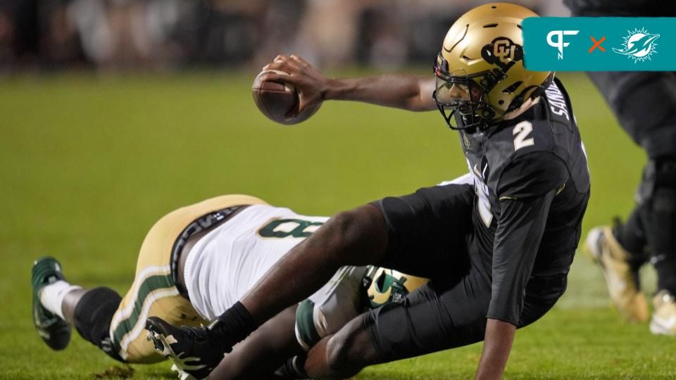 Colorado State Rams defensive lineman Mohamed Kamara (8) sacks Colorado Buffaloes quarterback Shedeur Sanders (2) during the first half at Folsom Field.