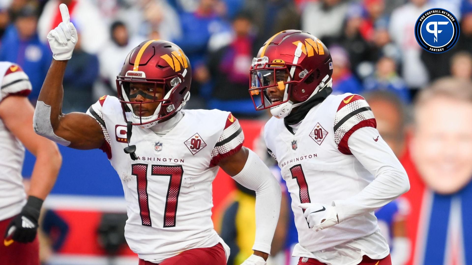 Washington Commanders wide receiver Jahan Dotson (1) celebrates his touchdown as wide receiver Terry McLaurin (17) gestures during the second half at MetLife Stadium.