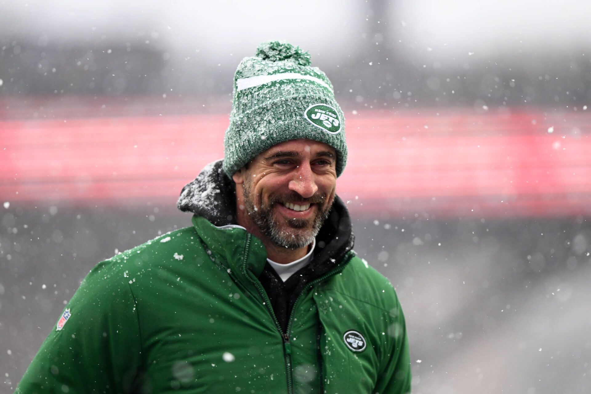 New York Jets quarterback Aaron Rodgers (8) walks off of the field before a game against the New England Patriots at Gillette Stadium.