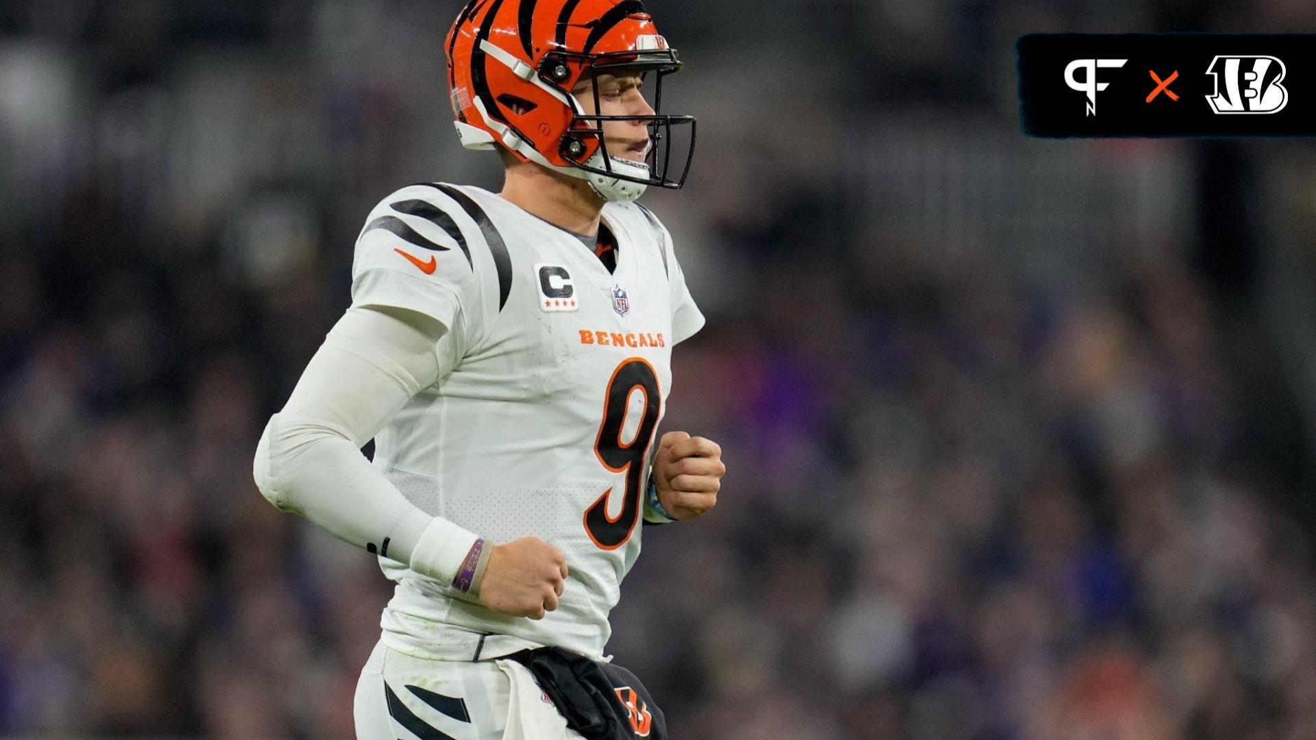 Cincinnati Bengals QB Joe Burrow (9) runs onto the field against the Baltimore Ravens.