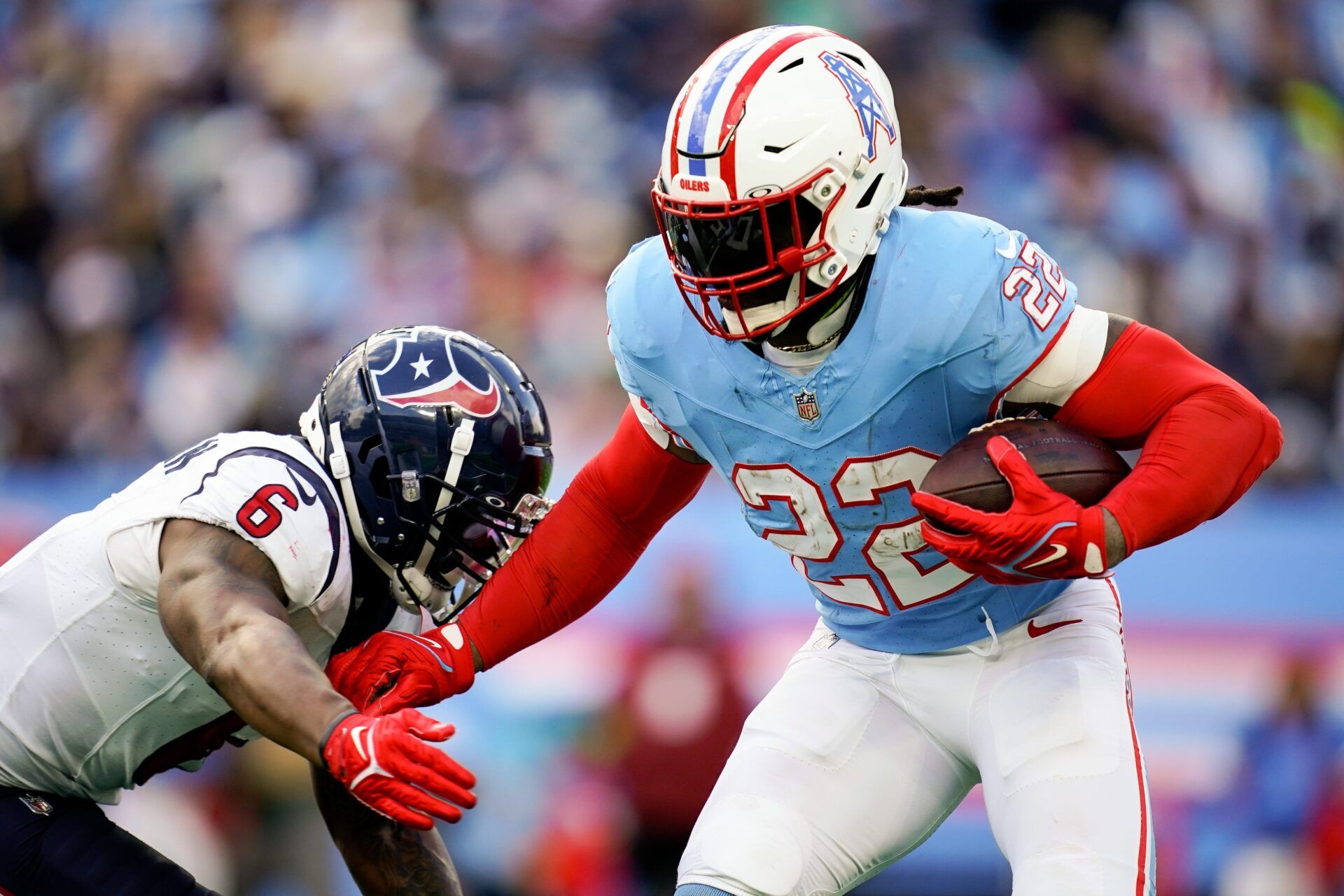 Tennessee Titans RB Derrick Henry (22) rushes the ball against the Houston Texans.