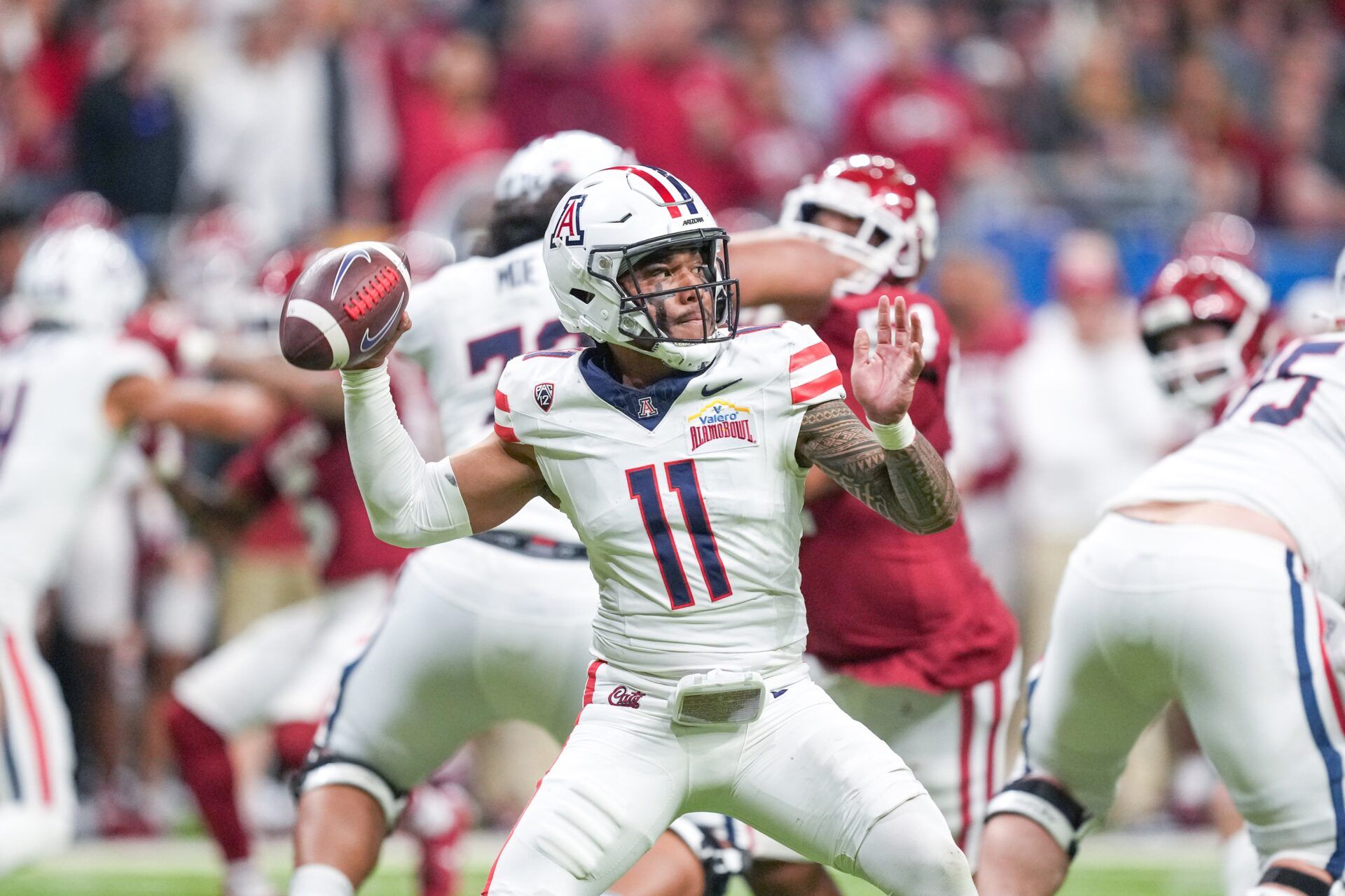 Arizona Wildcats quarterback Noah Fifita (11) throws a pass in the first half against the Oklahoma Sooners at Alamodome. Mandatory Credit: Daniel Dunn-USA TODAY Sports