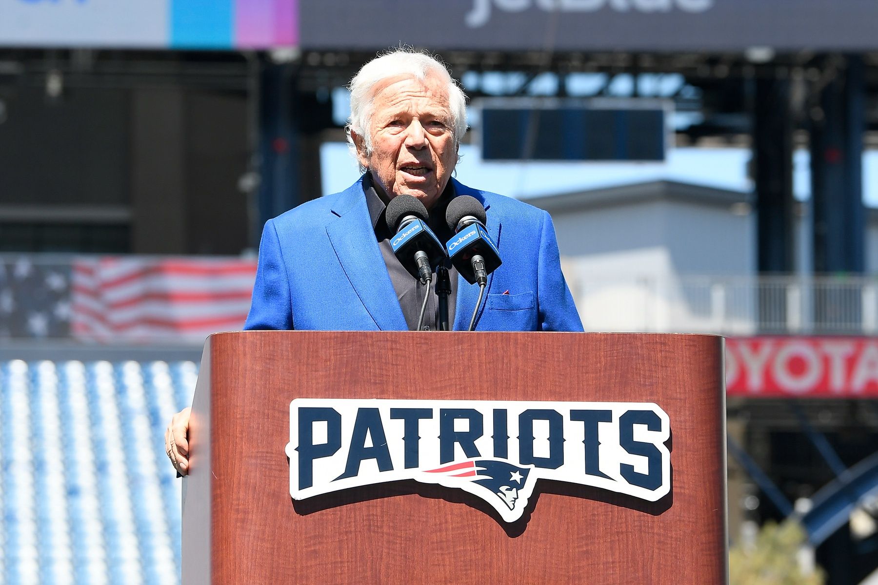 New England Patriots owner Robert Kraft introduces the team's number one draft pick on the game field at Gillette Stadium.