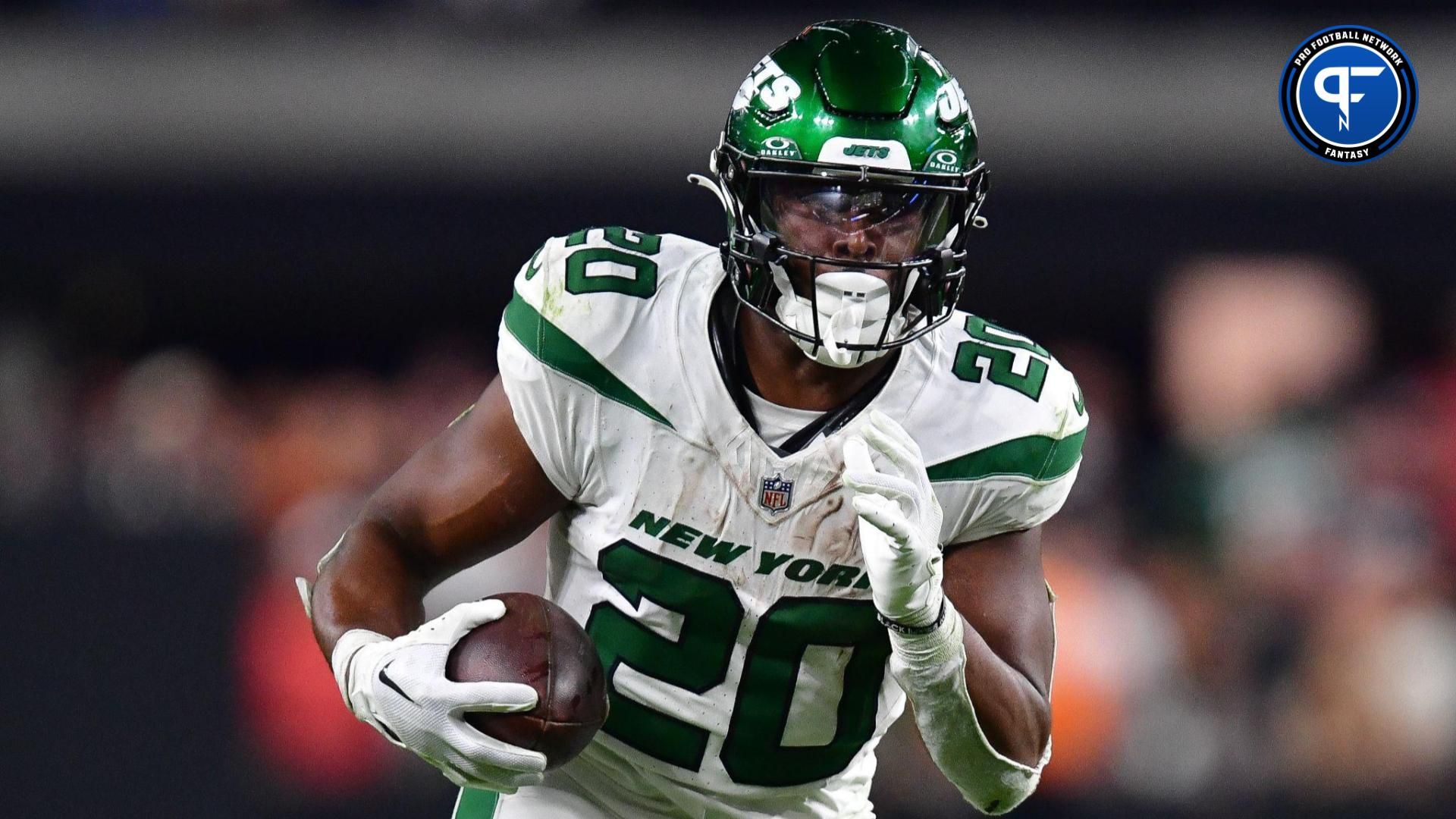 New York Jets running back Breece Hall (20) runs the ball against the Las Vegas Raiders during the second half at Allegiant Stadium.