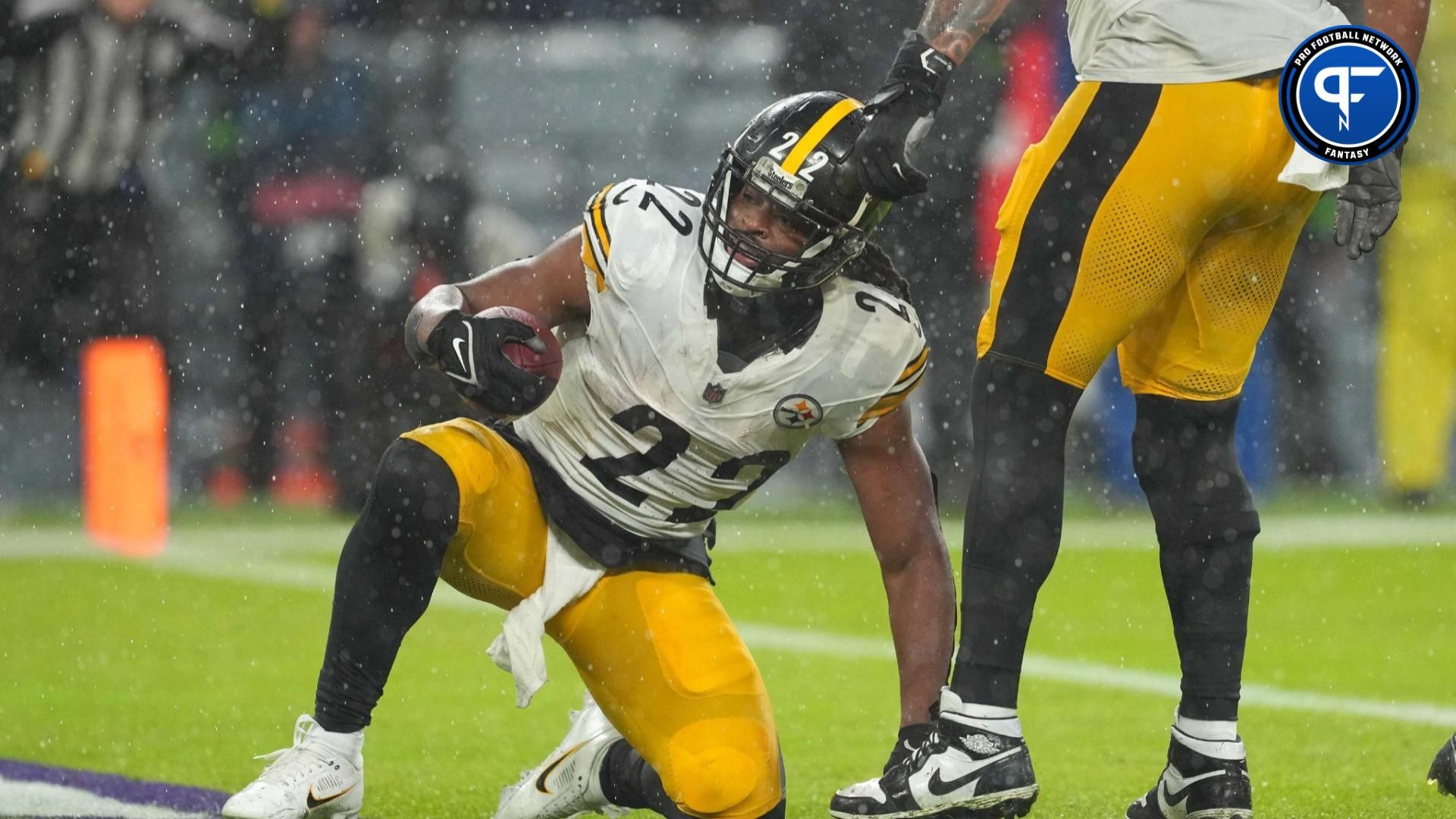 Pittsburgh Steelers RB Najee Harris (23) on one knee after scoring a touchdown against the Baltimore Ravens.