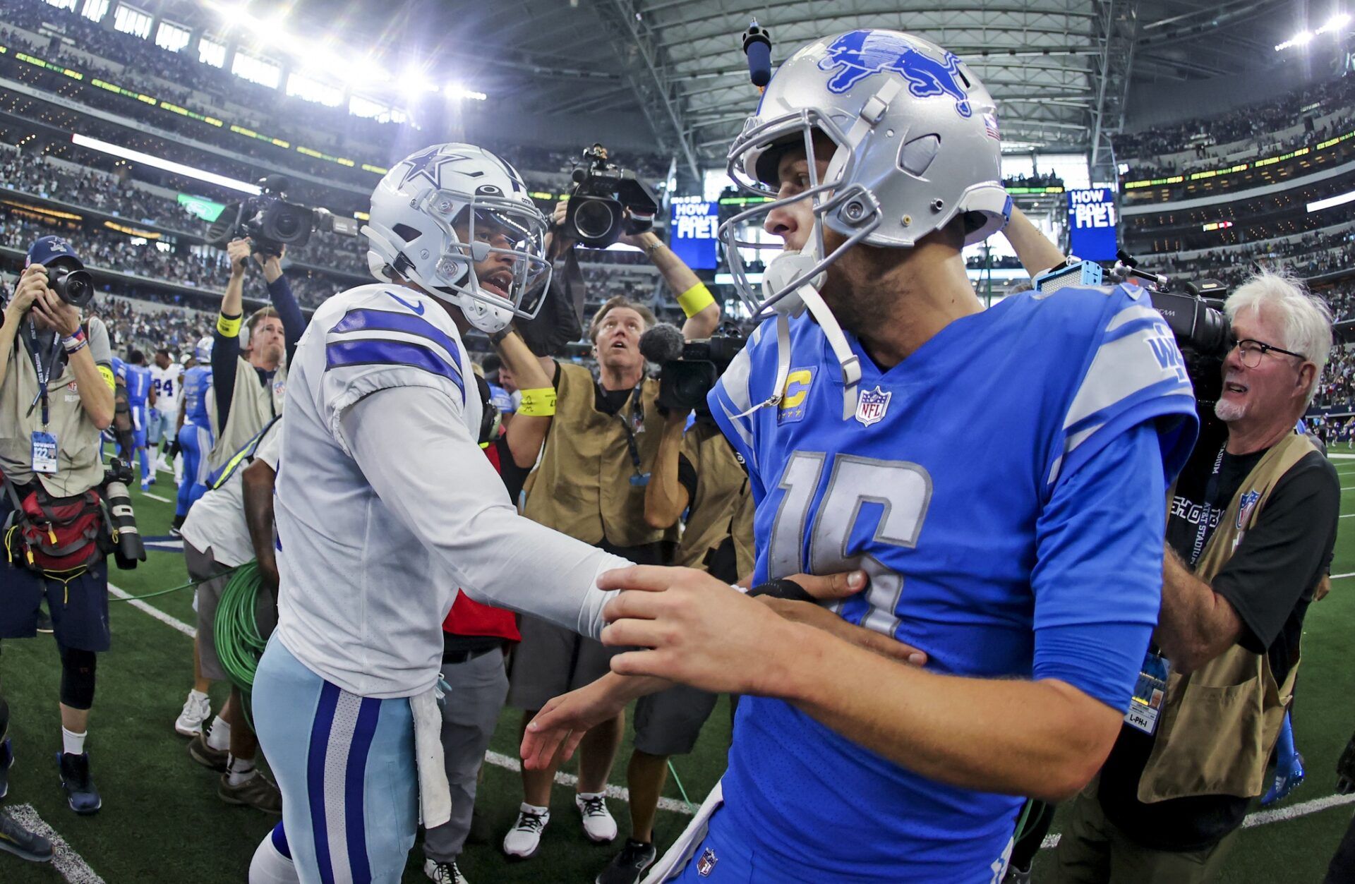 Oct 23, 2022; Arlington, Texas, USA; Dallas Cowboys quarterback Dak Prescott (4) greets Detroit Lions quarterback Jared Goff (16) after the game at AT&T Stadium. Mandatory Credit: Kevin Jairaj-USA TODAY Sports