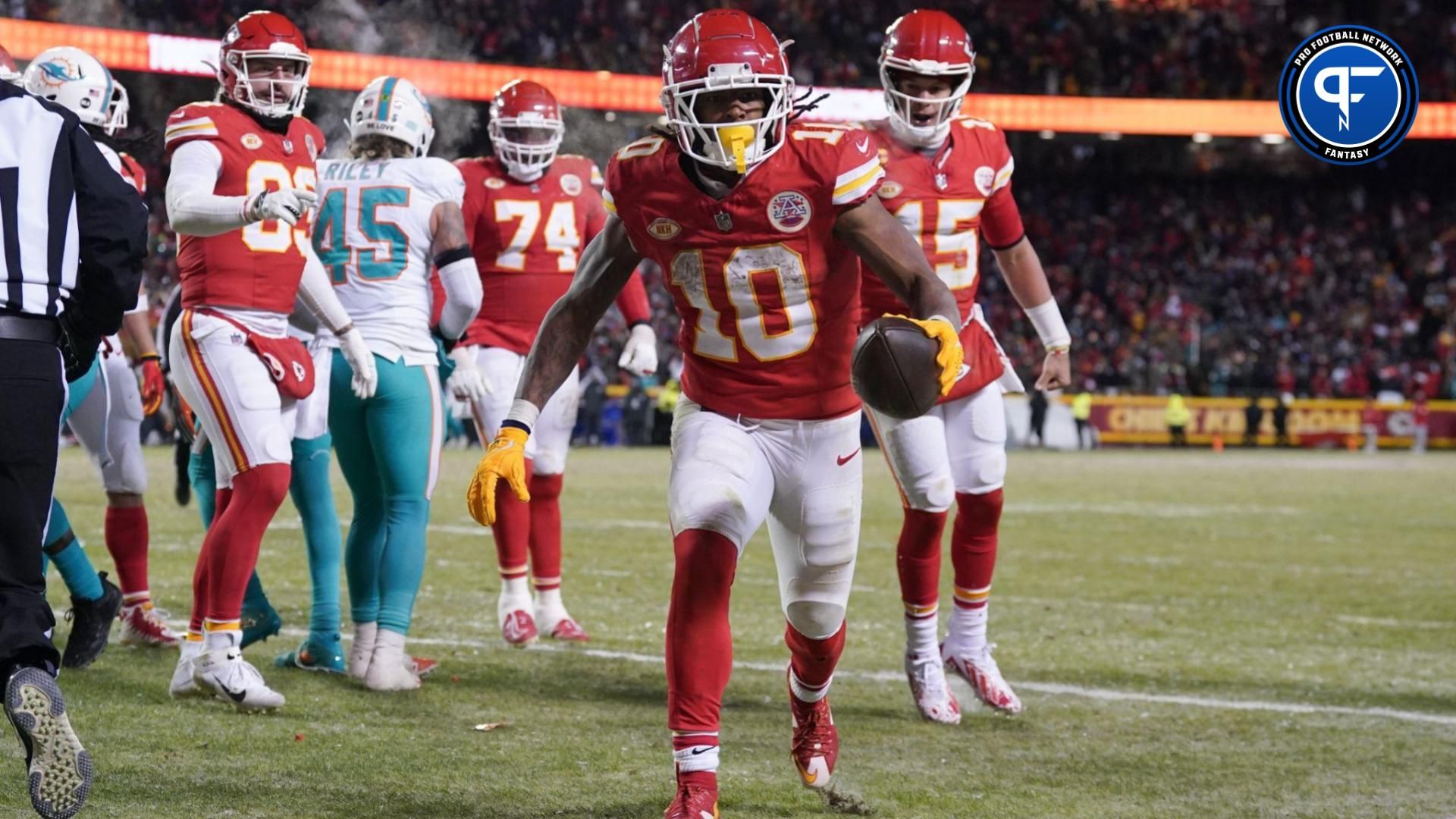 Kansas City Chiefs running back Isiah Pacheco (10) celebrates his touchdown scored against the Miami Dolphins with quarterback Patrick Mahomes (15) during the second half of the 2024 AFC wild card game at GEHA Field at Arrowhead Stadium.