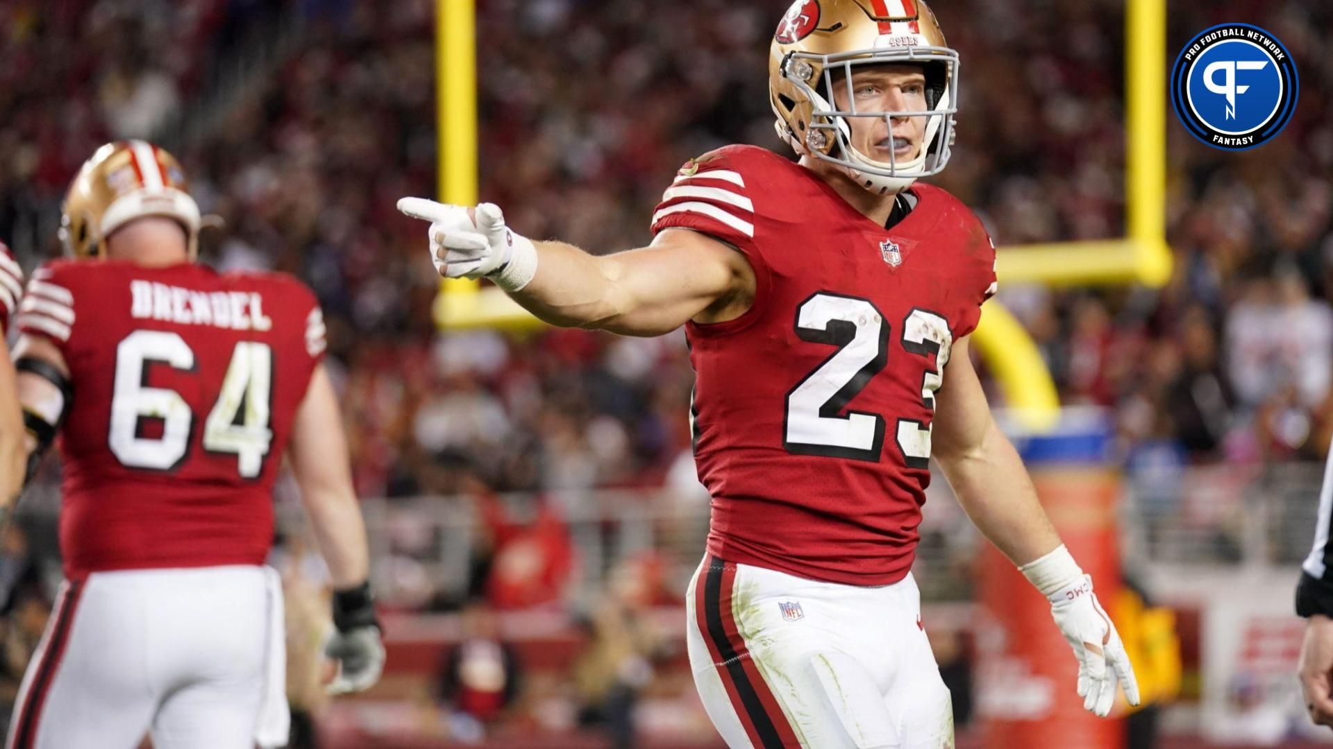 San Francisco 49ers RB Christian McCaffrey (23) signals a first down against the Baltimore Ravens.