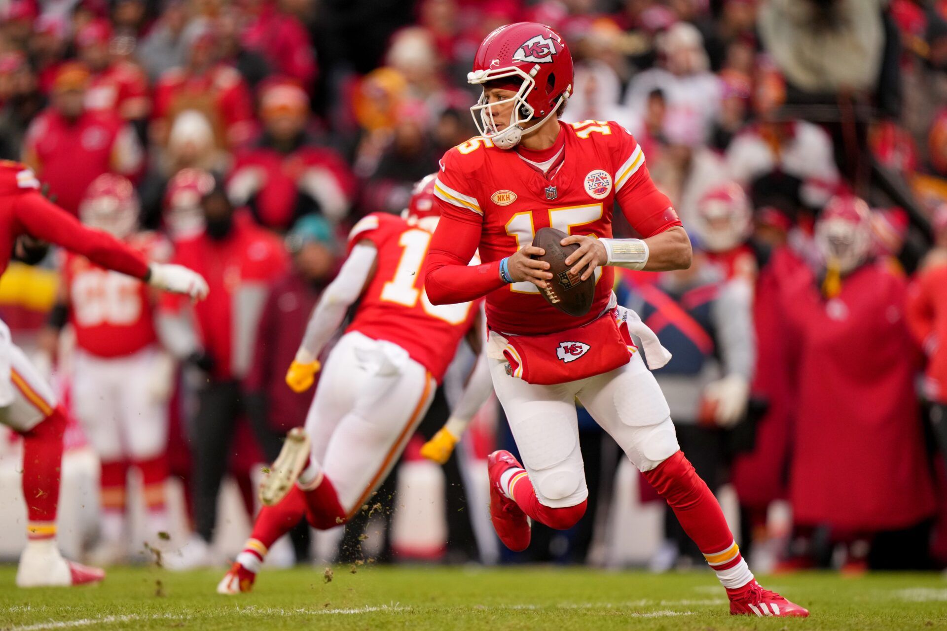 Kansas City Chiefs quarterback Patrick Mahomes (15) roll out of the pocket in the first quarter during a Week 17 NFL football game between the Cincinnati Bengals and the Kansas City Chiefs, Sunday, Dec. 31, 2023, at GEHA Field at Arrowhead Stadium in Kansas City, Mo.