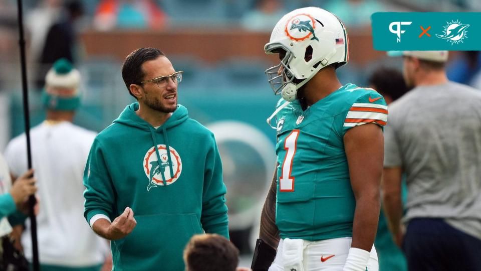 Miami Dolphins head coach Mike McDaniel talks with quarterback Tua Tagovailoa (1) prior to the game against the Dallas Cowboys at Hard Rock Stadium.