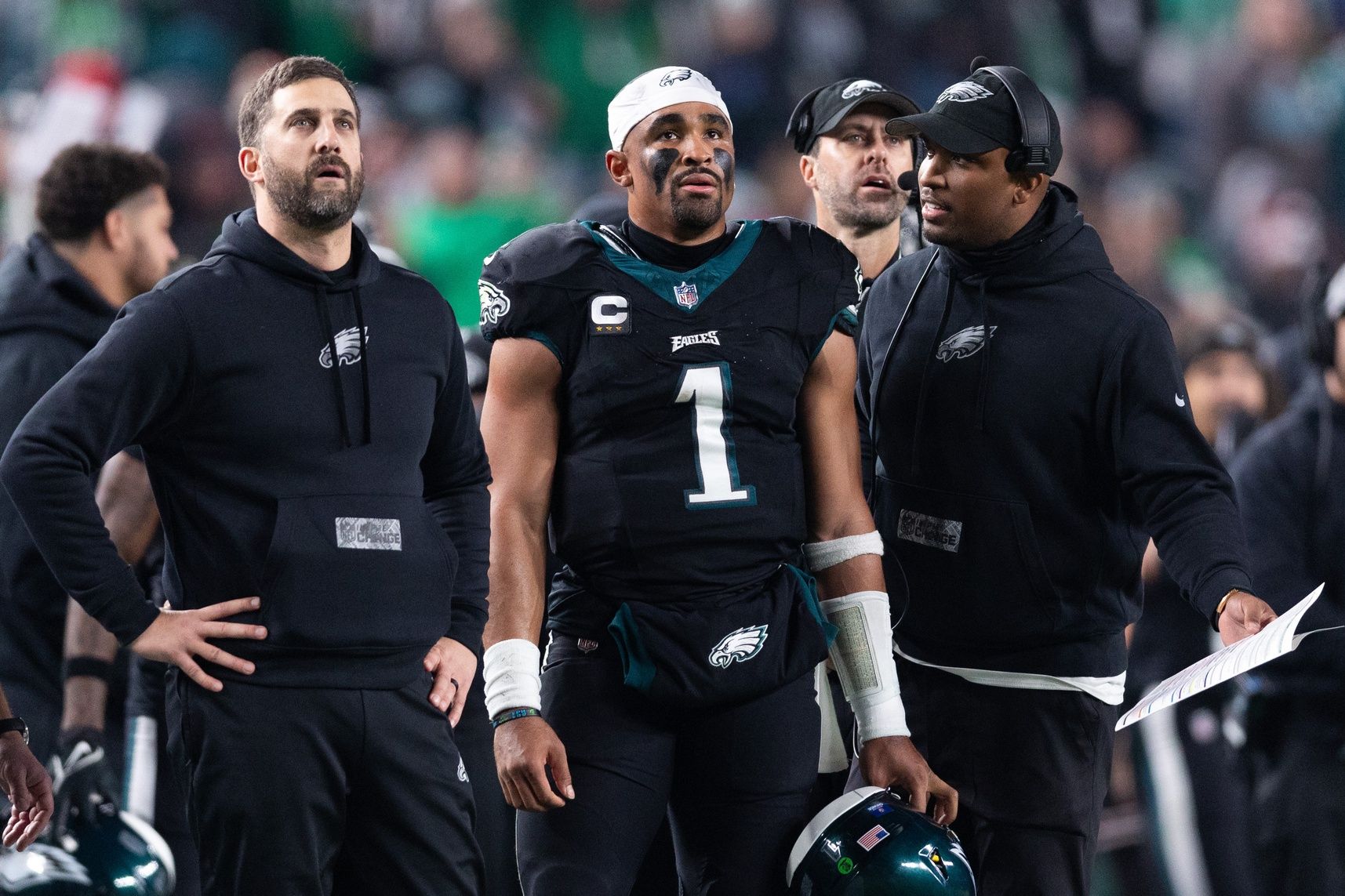 Philadelphia Eagles head coach Nick Sirianni (L) and quarterback Jalen Hurts (1) and offensive coordinator Brian Johnson (R) talk during the second quarter against the New York Giants at Lincoln Financial Field. Mandatory Credit: Bill Streicher-USA TODAY Sports