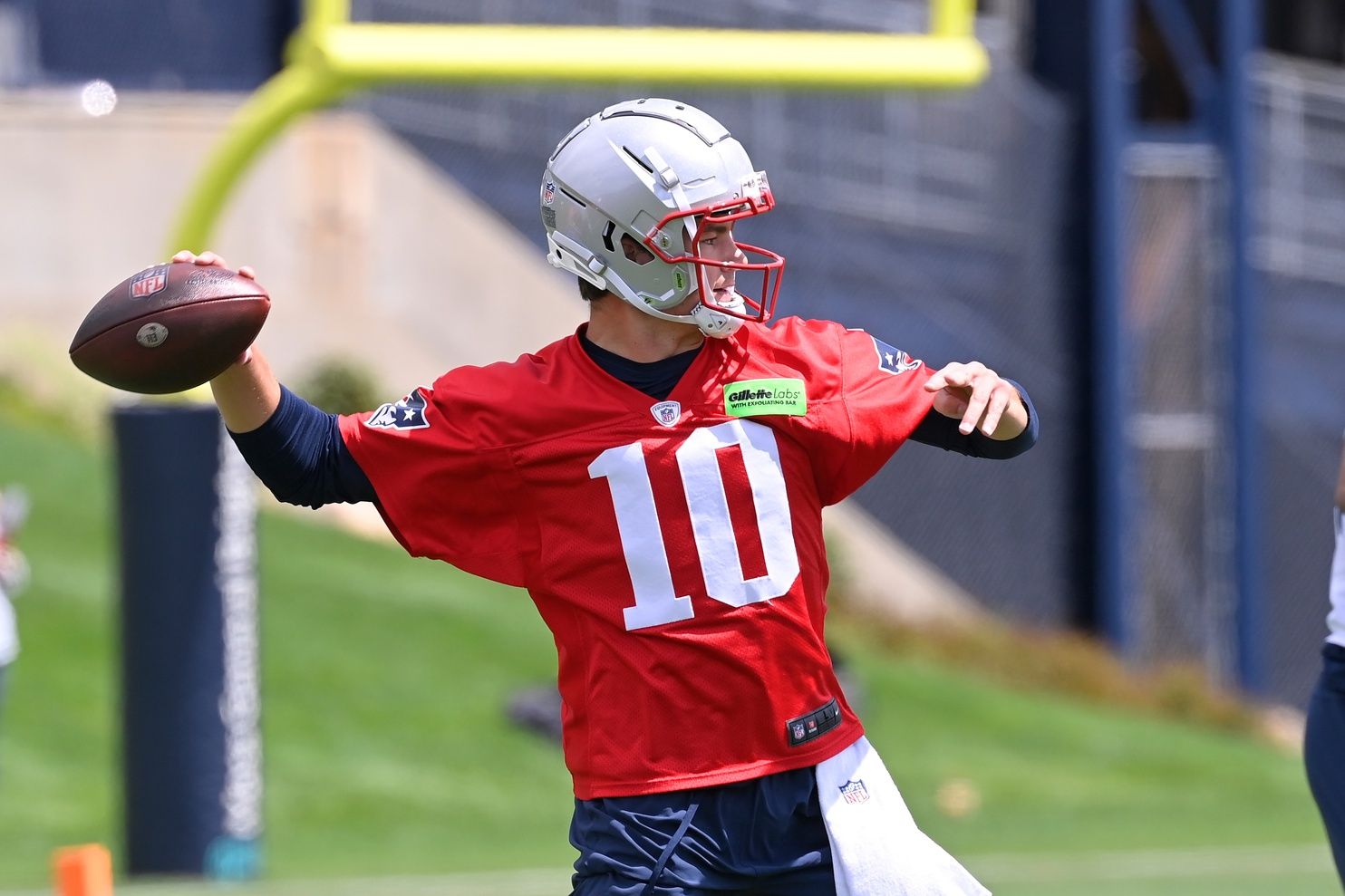 New England Patriots QB Drake Maye (10) throws passes during the team's minicamp.