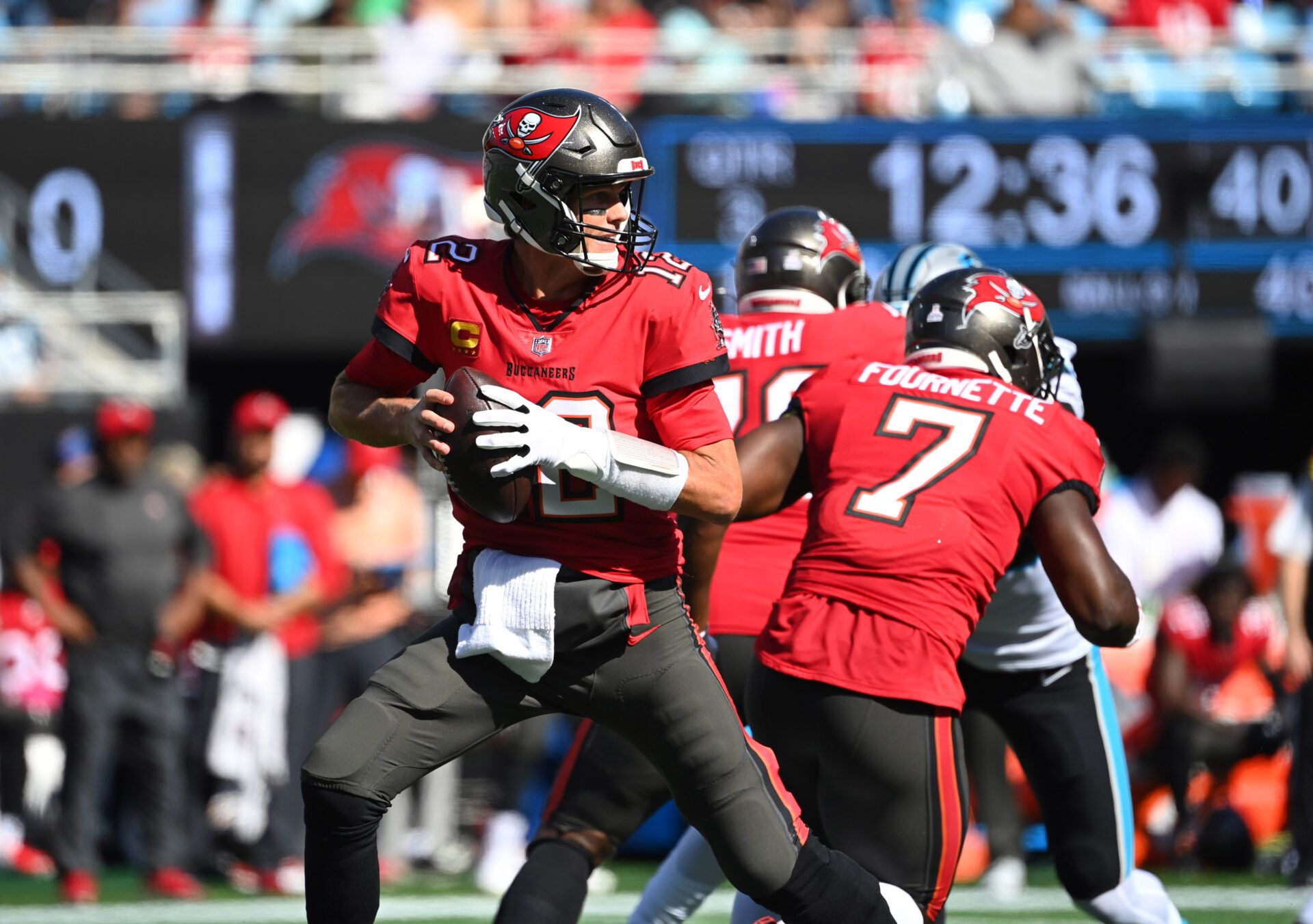 Tampa Bay Buccaneers quarterback Tom Brady (12) looks to pass in the third quarter at Bank of America Stadium.