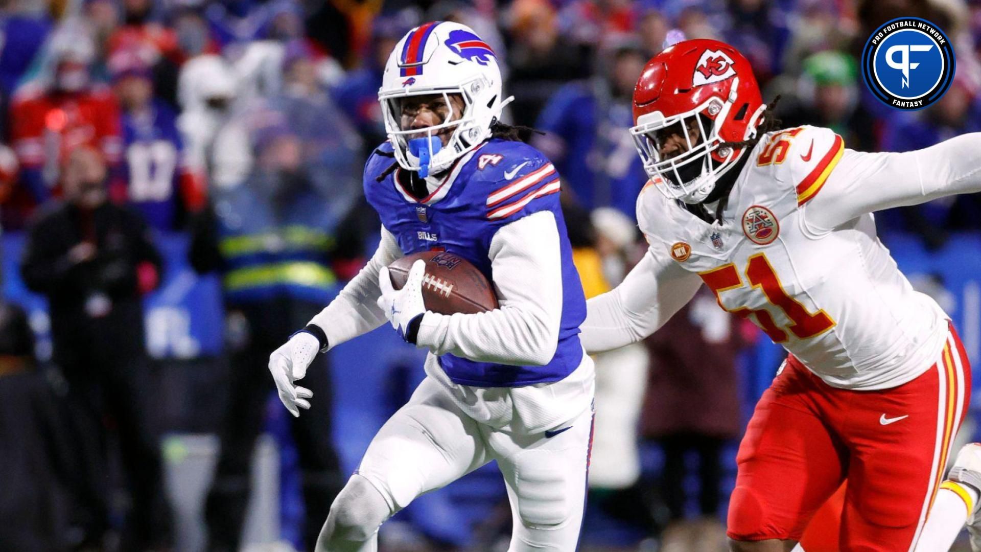 Buffalo Bills running back James Cook (4) runs past Kansas City Chiefs defensive end Mike Danna (51).