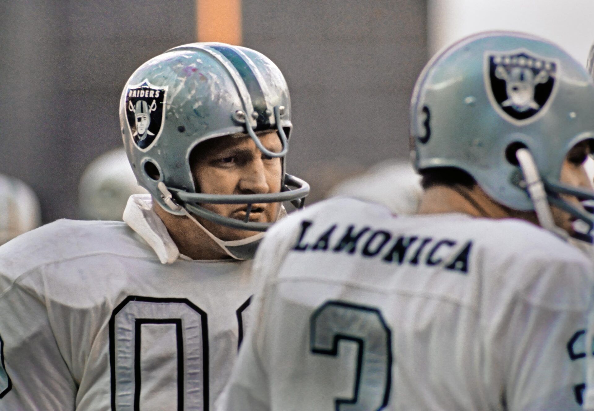 Oakland Raiders center Jim Otto (00) talks to Daryle Lamonica (3) on the sideline against the New York Jets.