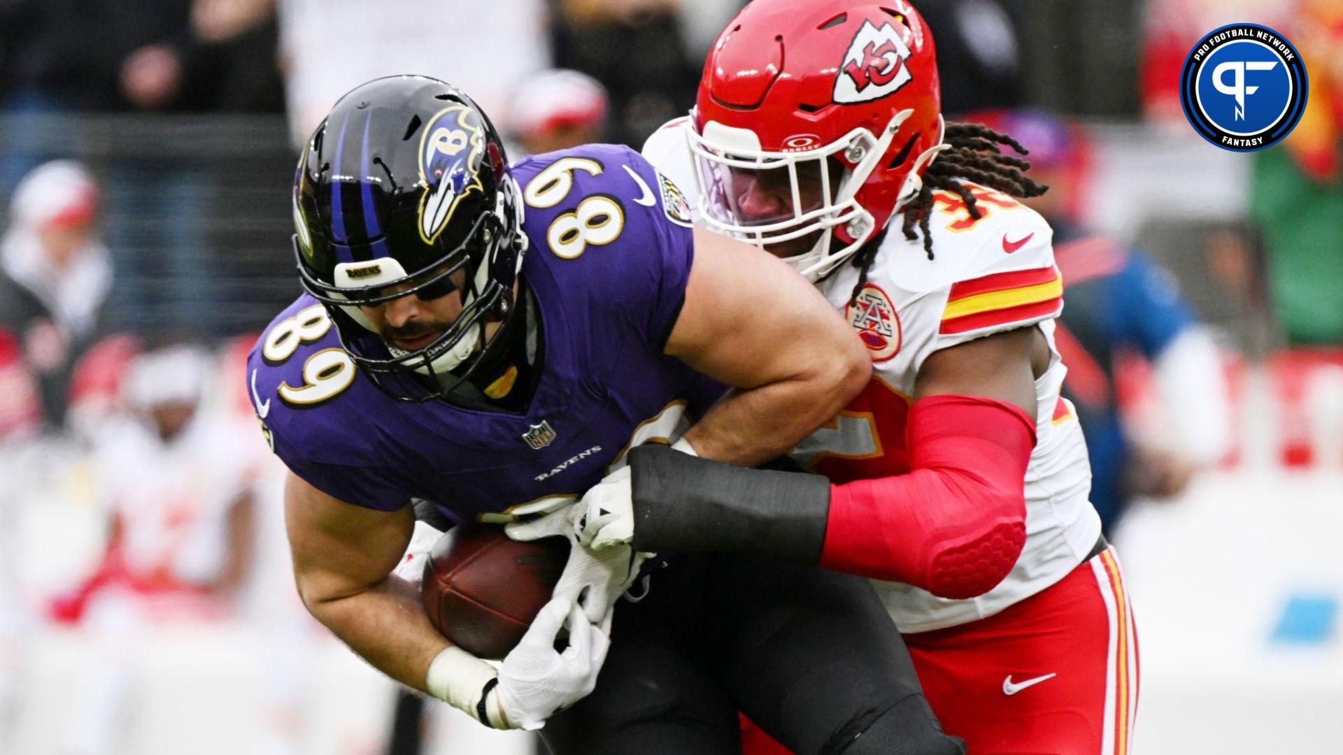 Baltimore Ravens TE Mark Andrews (89) fights for extra yardage against the Kansas City Chiefs.