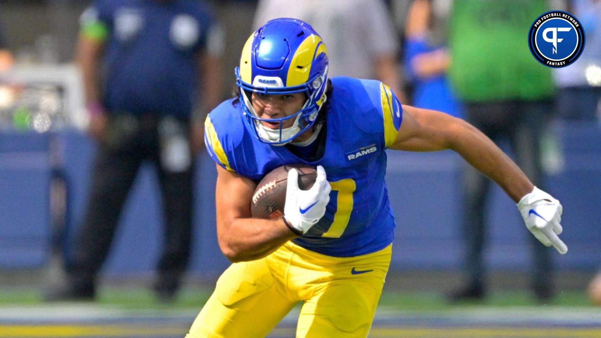 Los Angeles Rams wide receiver Puka Nacua (17) runs for a first down before he is stopped by Philadelphia Eagles cornerback James Bradberry (24) in the first half at SoFi Stadium.