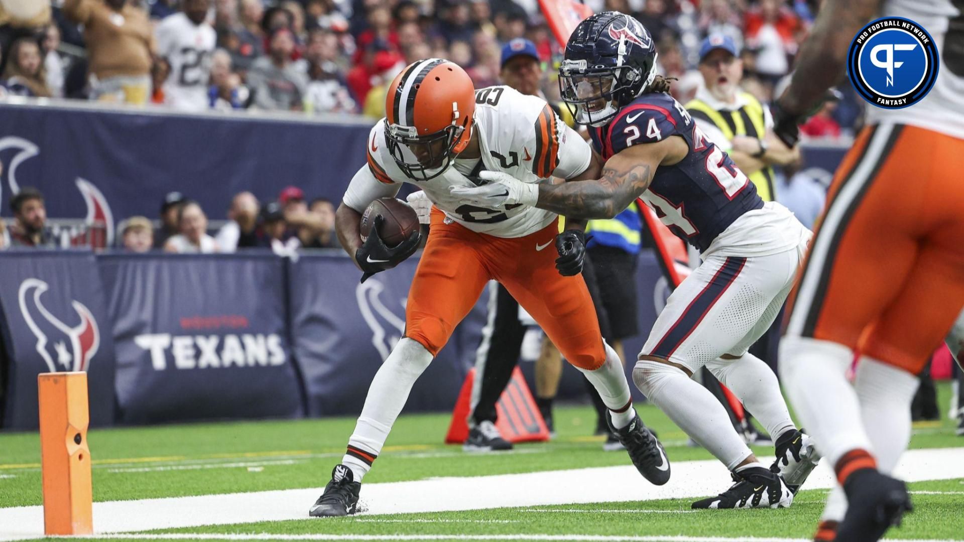 Cleveland Browns wide receiver Amari Cooper (2) steps out of bounds after a reception as Houston Texans cornerback Derek Stingley Jr. (24) defends during the fourth quarter at NRG Stadium.