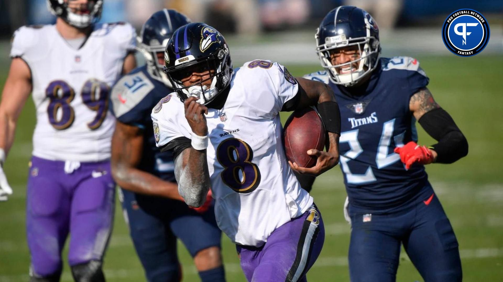 Baltimore Ravens quarterback Lamar Jackson (8) runs for a touchdown during their 20-13 victory over the Tennessee Titans in the AFC Wild Card game at Nissan Stadium in Nashville Jan. 10, 2021.