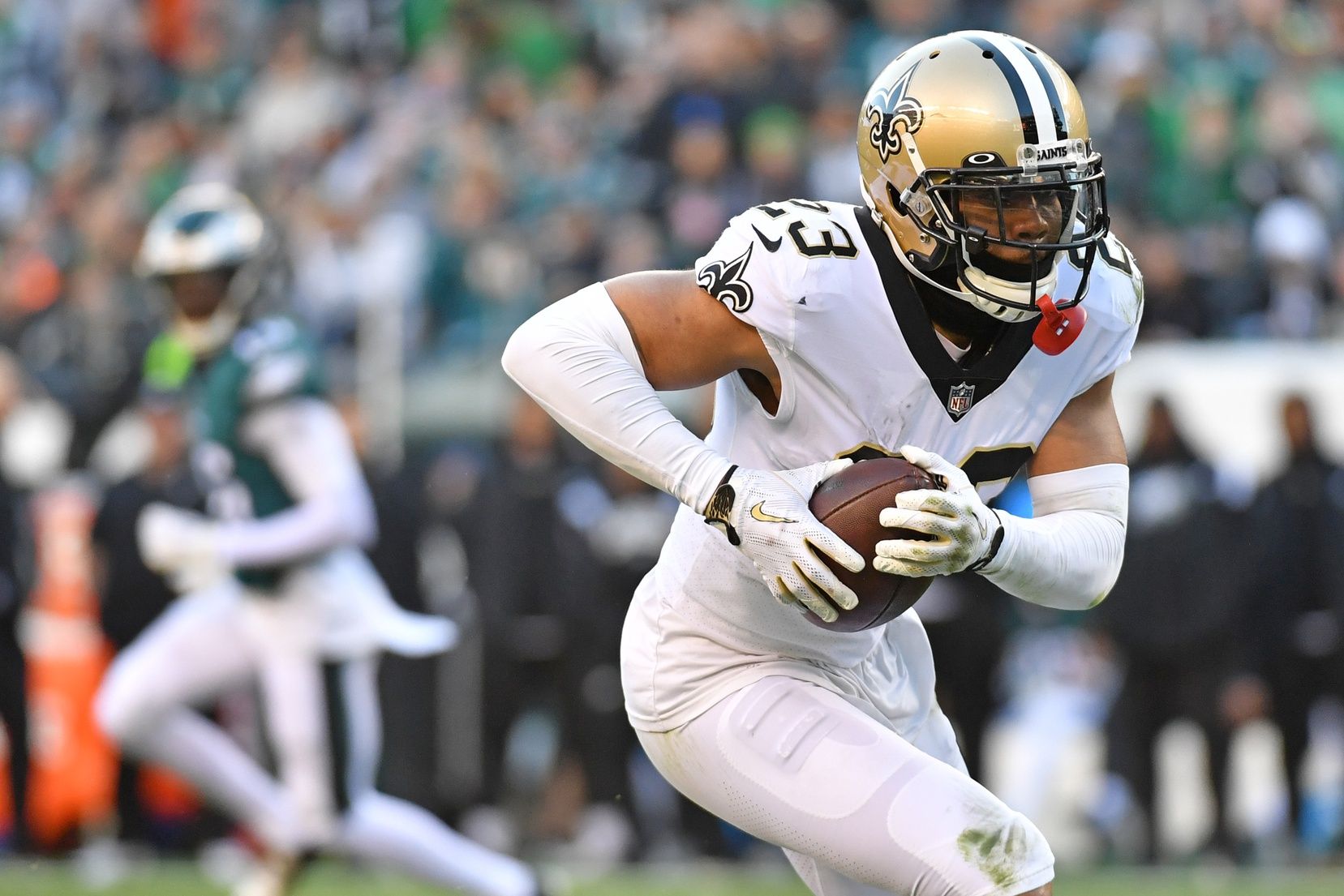 New Orleans Saints cornerback Marshon Lattimore (23) runs with the football after intercepting a pass against the Philadelphia Eagles at Lincoln Financial Field. Mandatory Credit: Eric Hartline-USA TODAY Sports