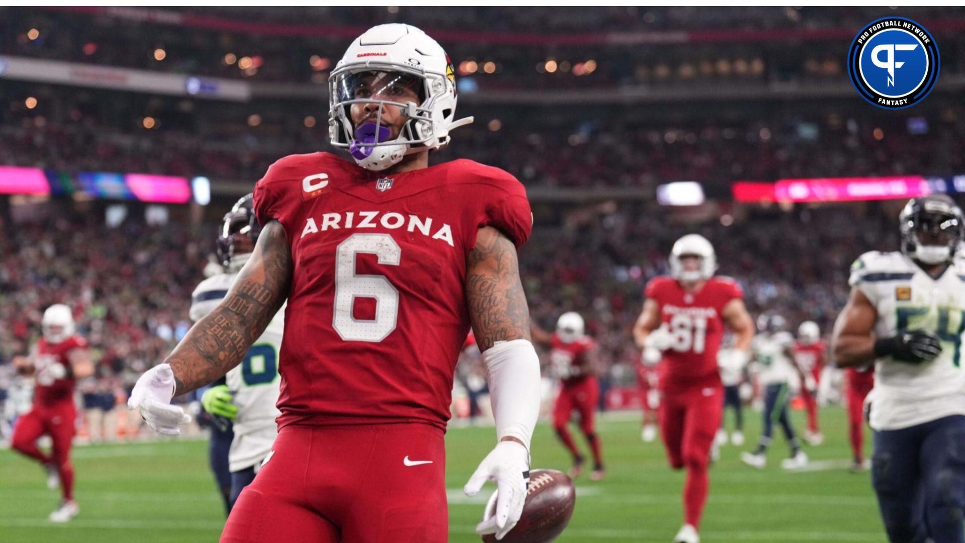 Arizona Cardinals running back James Conner (6) celebrates a touchdown against the Seattle Seahawks during the second half at State Farm Stadium. Mandatory Credit: Joe Camporeale-USA TODAY Sports