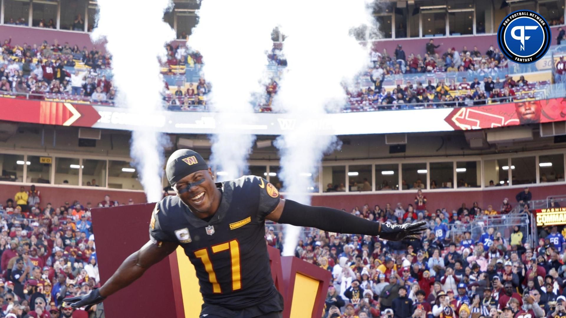 Washington Commanders wide receiver Terry McLaurin (17) runs onto the field prior to the game against the New York Giants at FedExField.