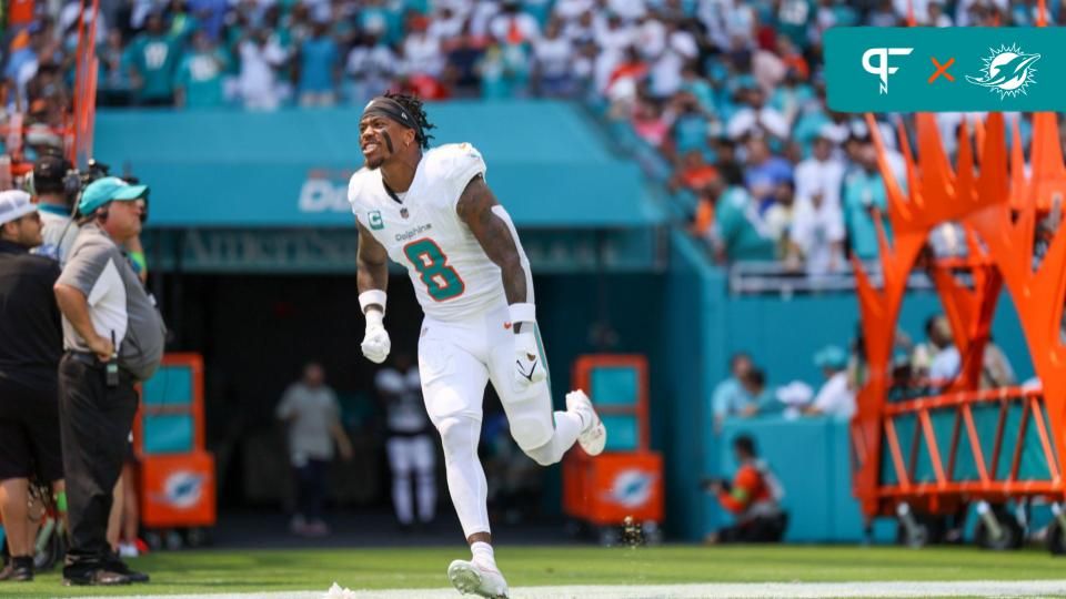 Miami Dolphins safety Jevon Holland (8) is introduced onto the field before a game against the Denver Broncos at Hard Rock Stadium.