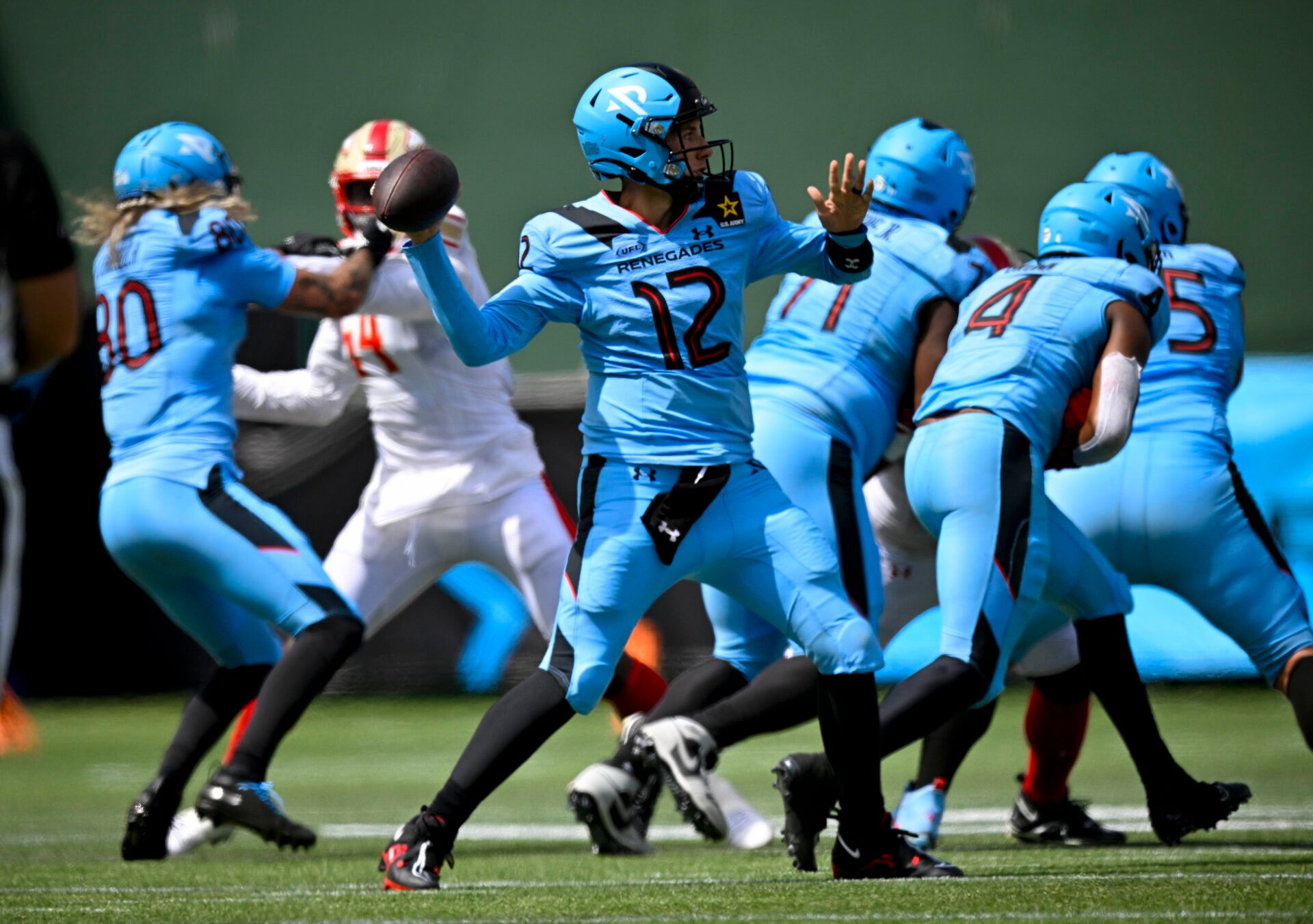 Arlington Renegades quarterback Luis Perez (12) passes against the Birmingham Stallions during the second half at Choctaw Stadium.