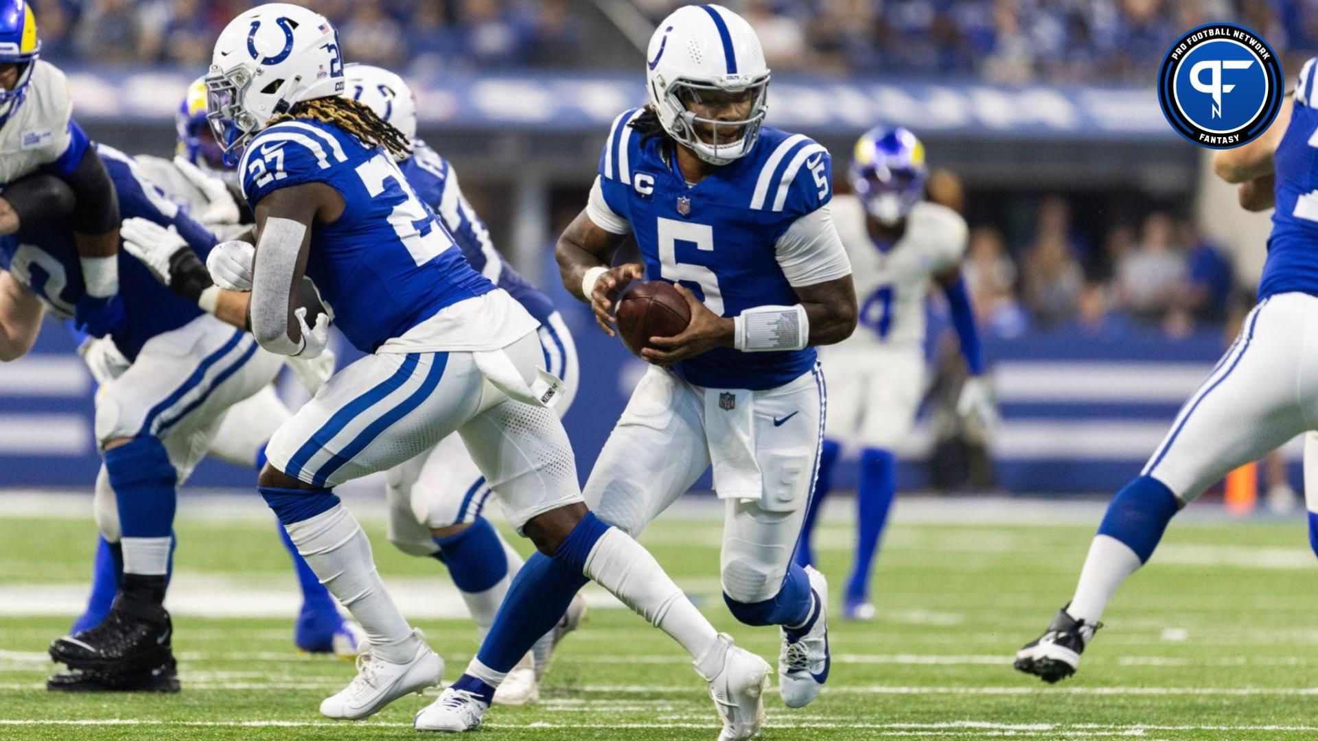 Indianapolis Colts quarterback Anthony Richardson (5) runs the ball in the second half against the Los Angeles Rams at Lucas Oil Stadium.