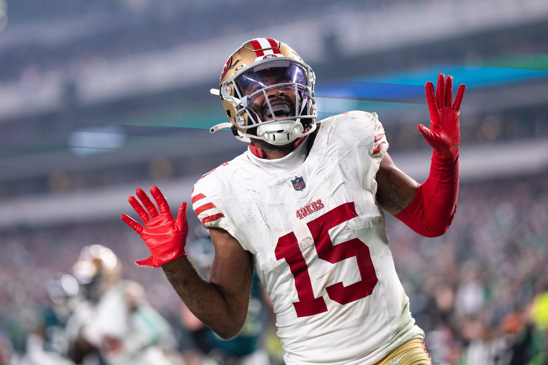 San Francisco 49ers wide receiver Jauan Jennings (15) reacts after scoring a touchdown against the Philadelphia Eagles during the fourth quarter at Lincoln Financial Field. Mandatory Credit: Bill Streicher-USA TODAY Sports