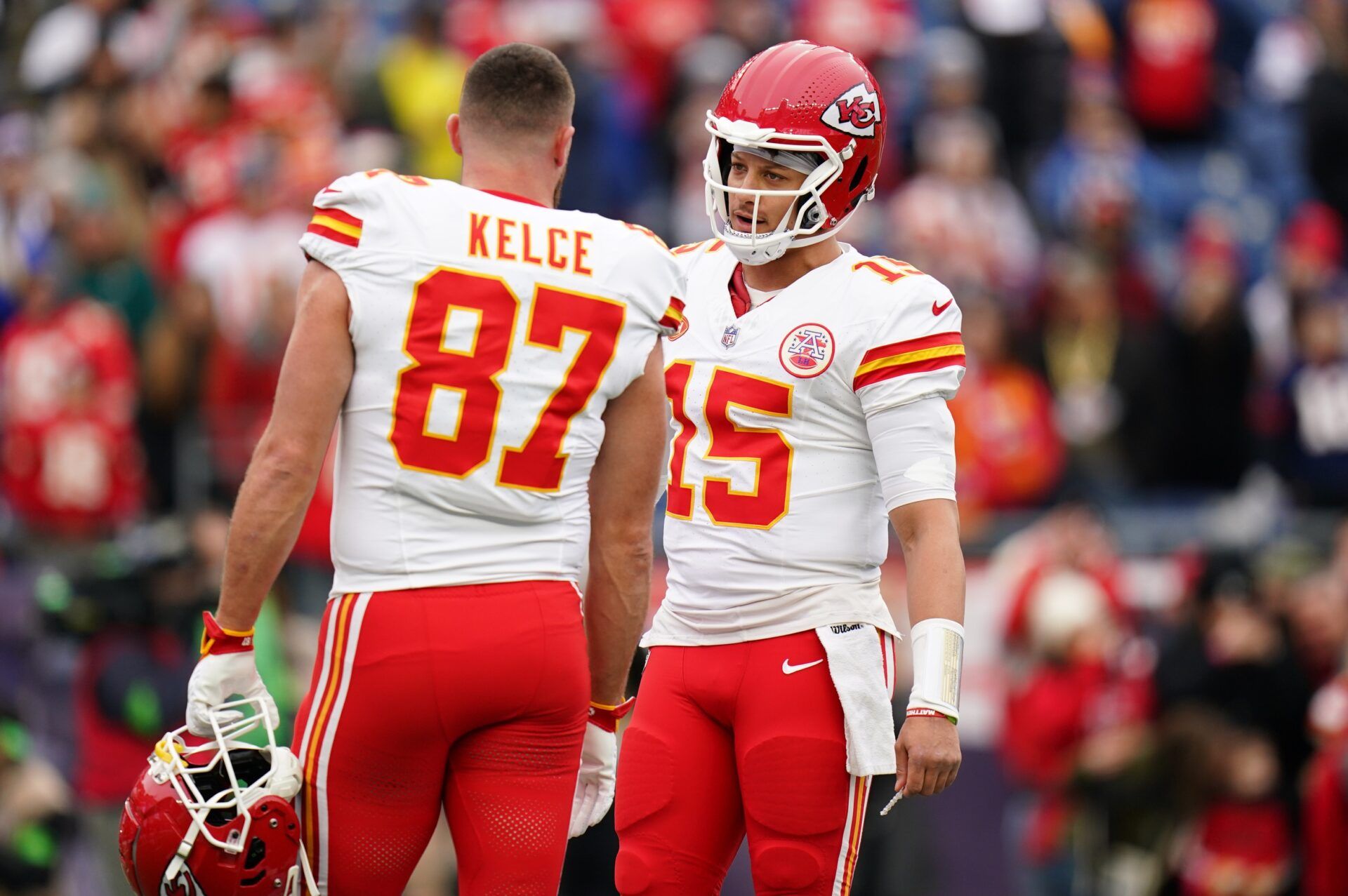 Kansas City Chiefs quarterback Patrick Mahomes (15) and tight end Travis Kelce (87) warm up before the game against the New England Patriots at Gillette Stadium. Mandatory Credit: David Butler II-USA TODAY Sports