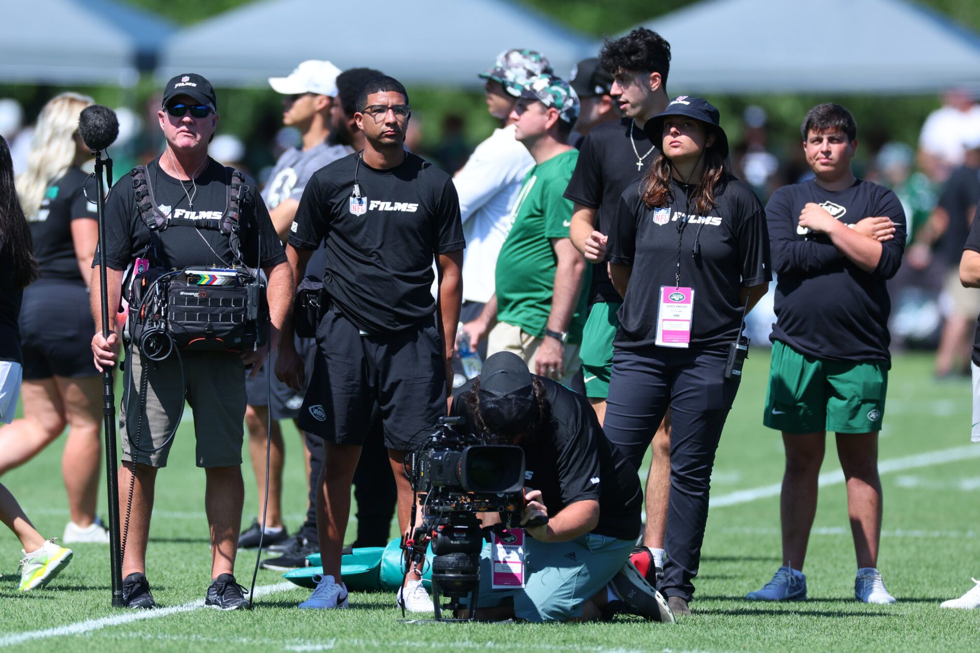 An NFL Films crew for the HBO television series Hard Knocks on the field during the New York Jets Training Camp at Atlantic Health Jets Training Center.