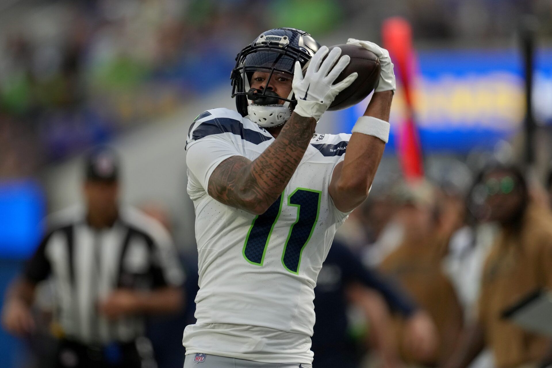 Seattle Seahawks wide receiver Jaxon Smith-Njigba (11) makes a catch in the first quarter against the Los Angeles Rams at SoFi Stadium. Mandatory Credit: Kirby Lee-USA TODAY Sports