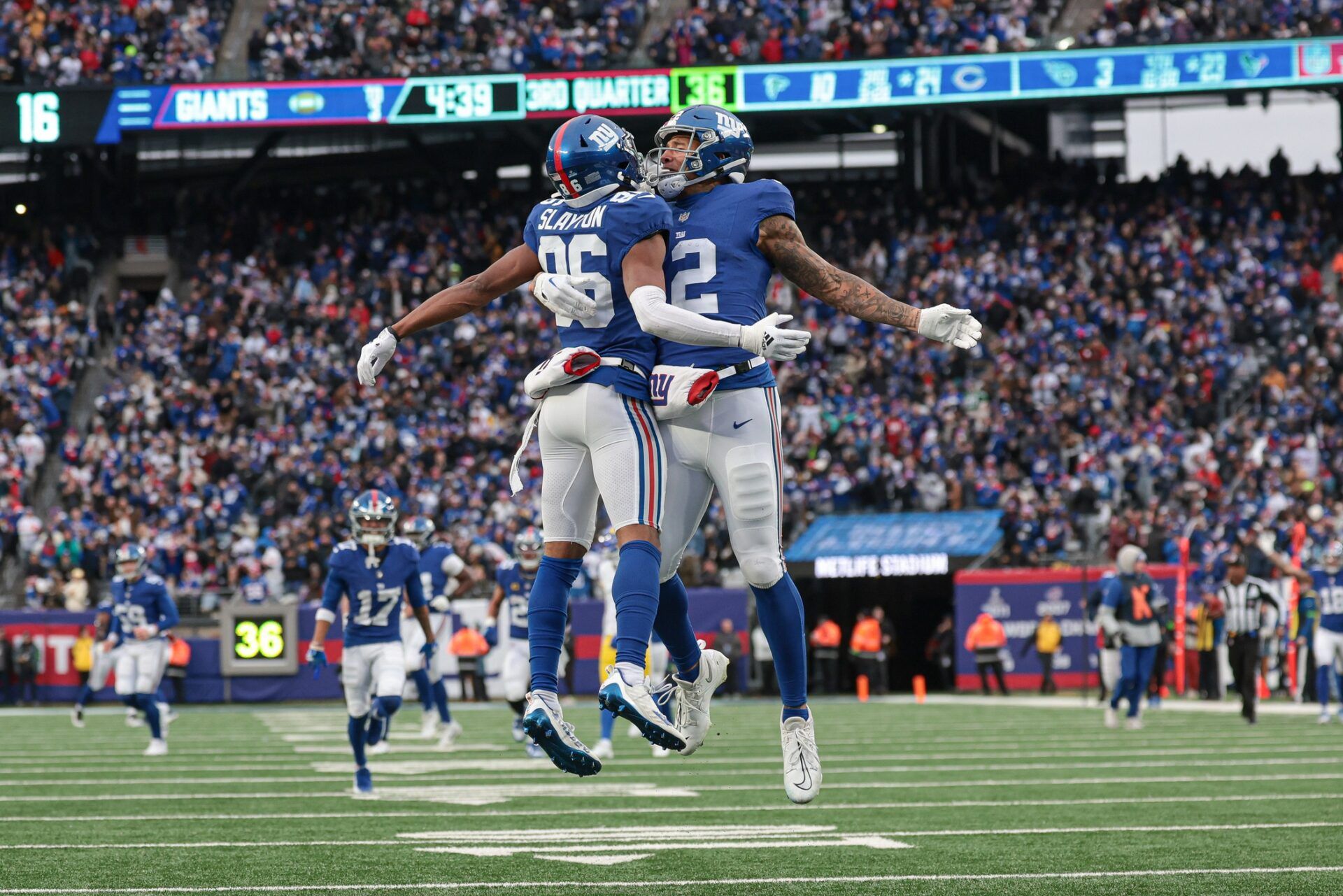 New York Giants wide receiver Darius Slayton (86) celebrates with tight end Darren Waller (12) after his touchdown reception during the second half against the Los Angeles Rams at MetLife Stadium.