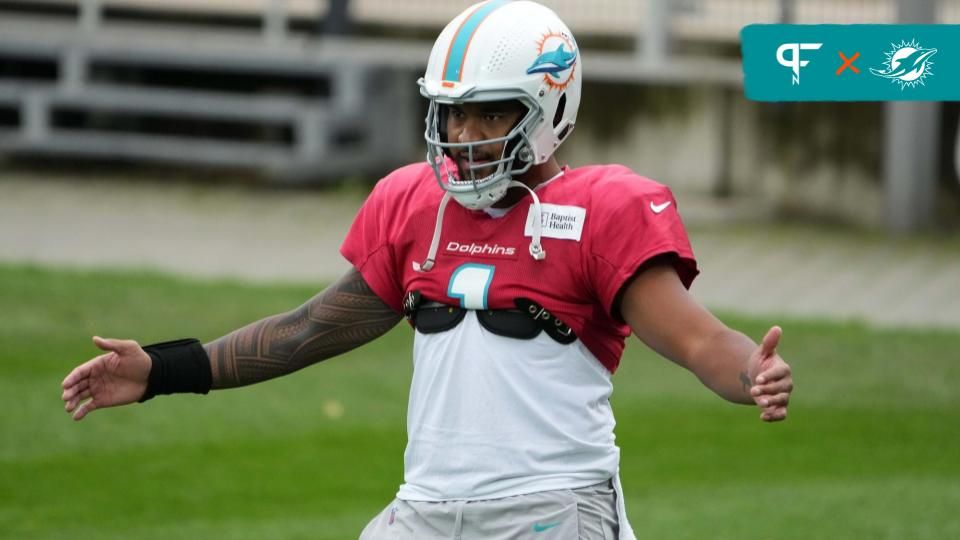 Miami Dolphins quarterback Tua Tagovailoa (1) gestures during practice at the PSD Bank Arena.