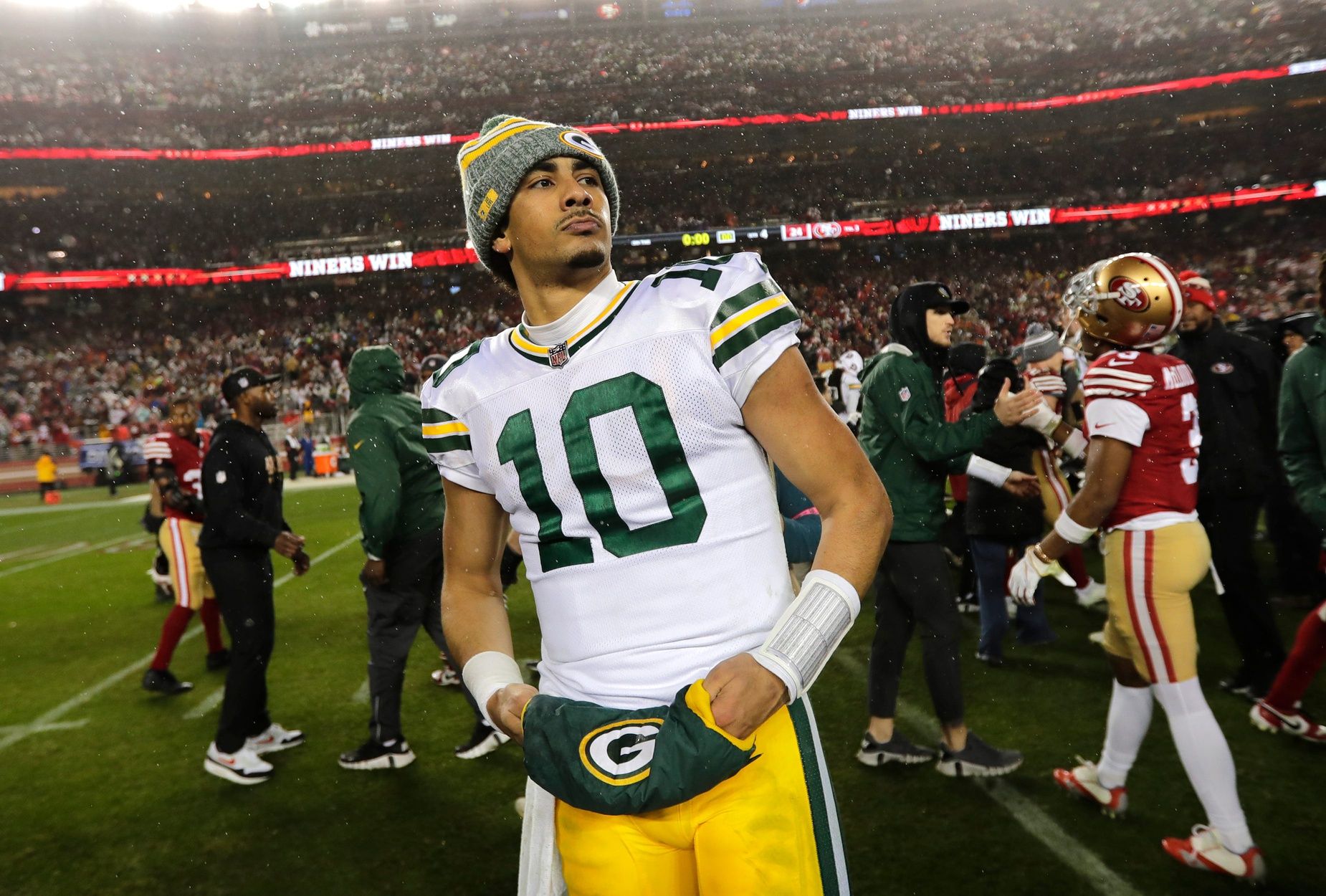 Green Bay Packers QB Jordan Love (10) on the field after a game against the San Francisco 49ers.