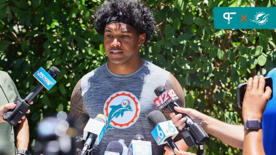 Miami Dolphins quarterback Tua Tagovailoa (1) speaks to reporters during mandatory minicamp at Baptist Health Training Complex.