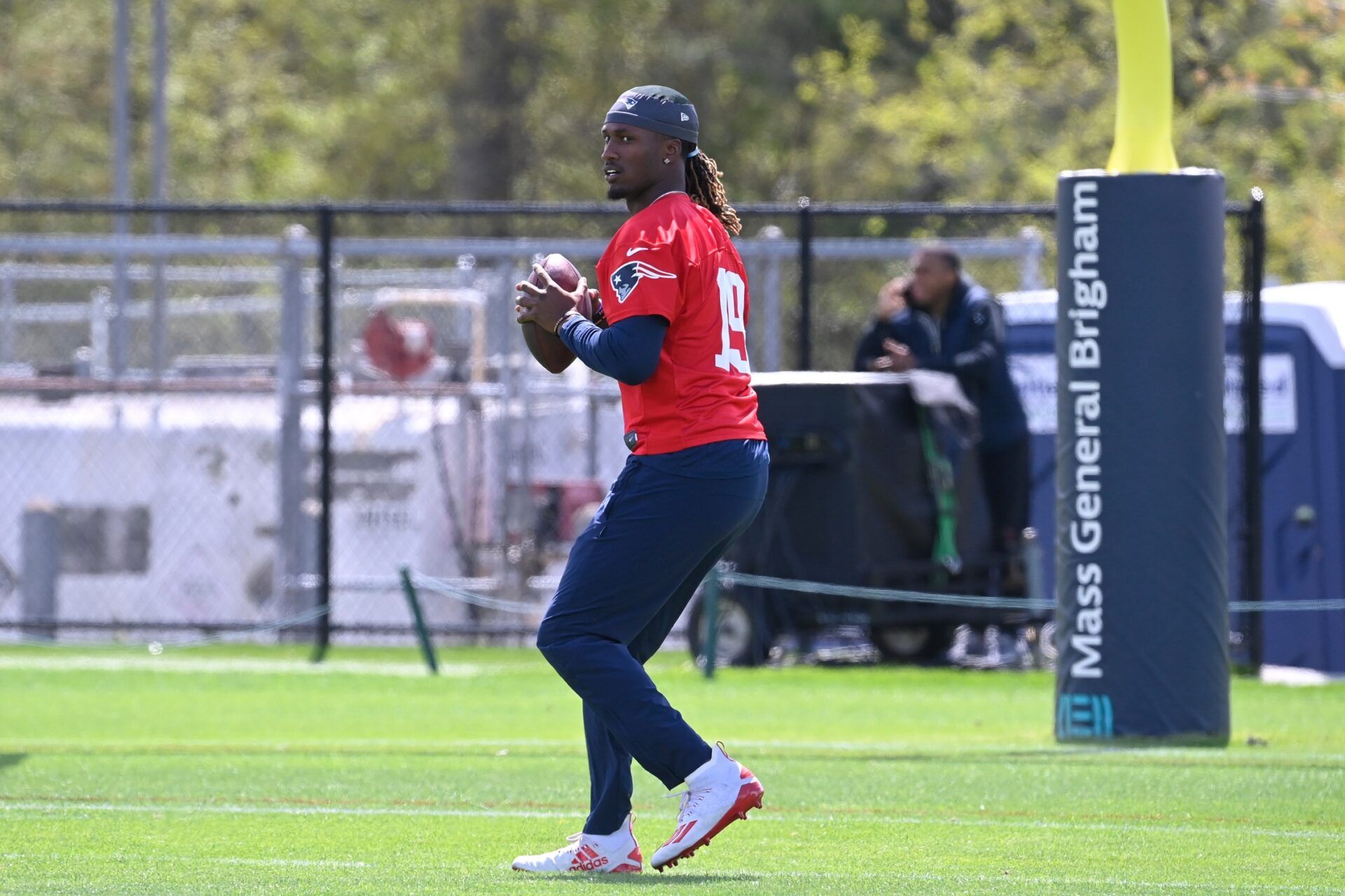 New England Patriots quarterback Joe Milton III (19) throws a pass at the New England Patriots rookie camp at Gillette Stadium.