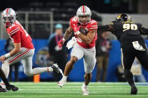 Ohio State Buckeyes RB TreVeyon Henderson (32) runs the ball against the Missouri Tigers.