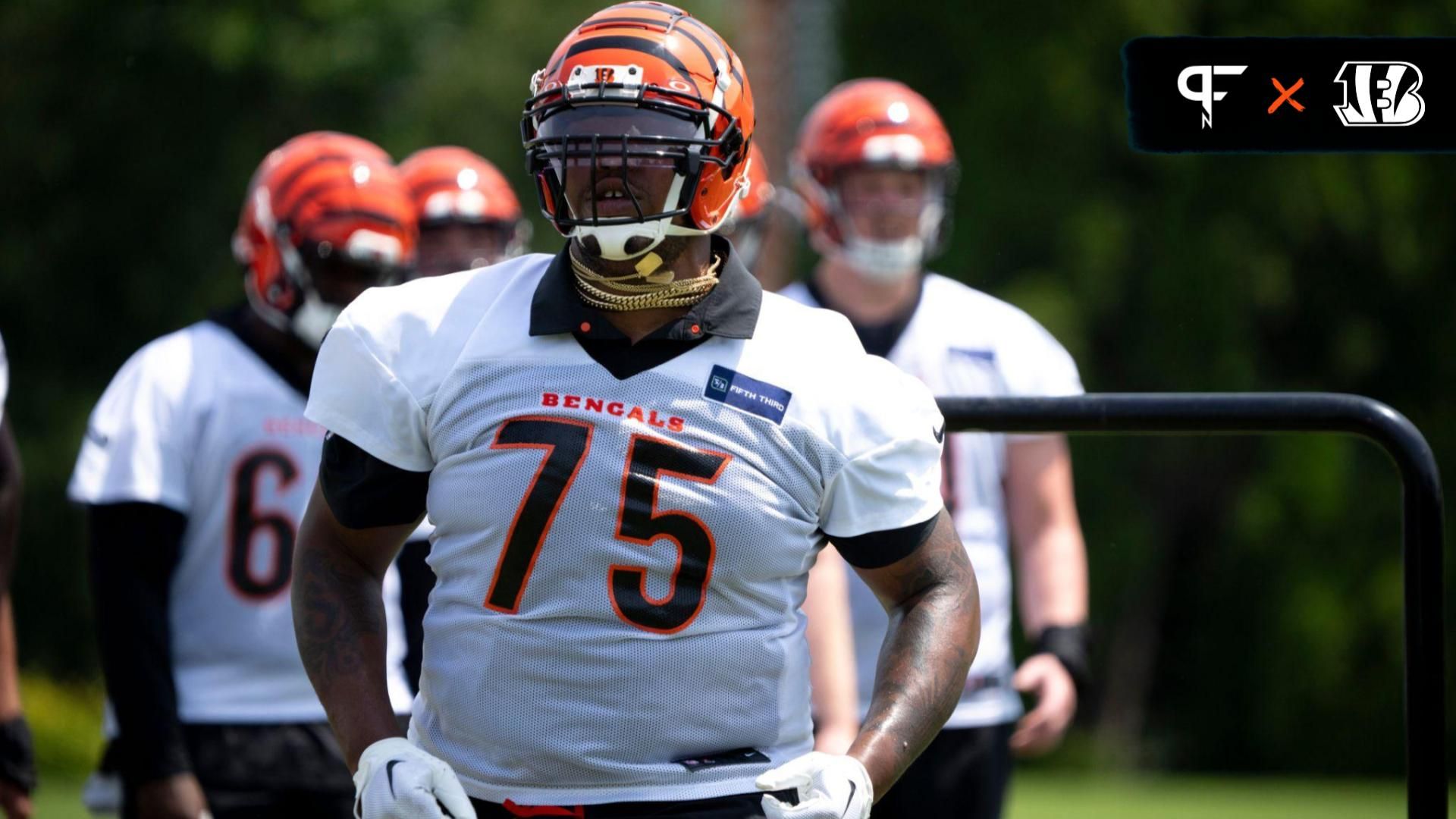 Cincinnati Bengals offensive tackle Orlando Brown Jr. (75) performs an under the bar drill at the Bengals NFL practice in Cincinnati.