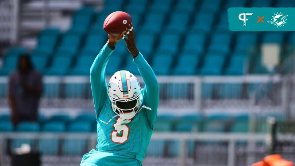 Miami Dolphins cornerback Jalen Ramsey (5) catches the football during mandatory minicamp at Baptist Health Training Complex.