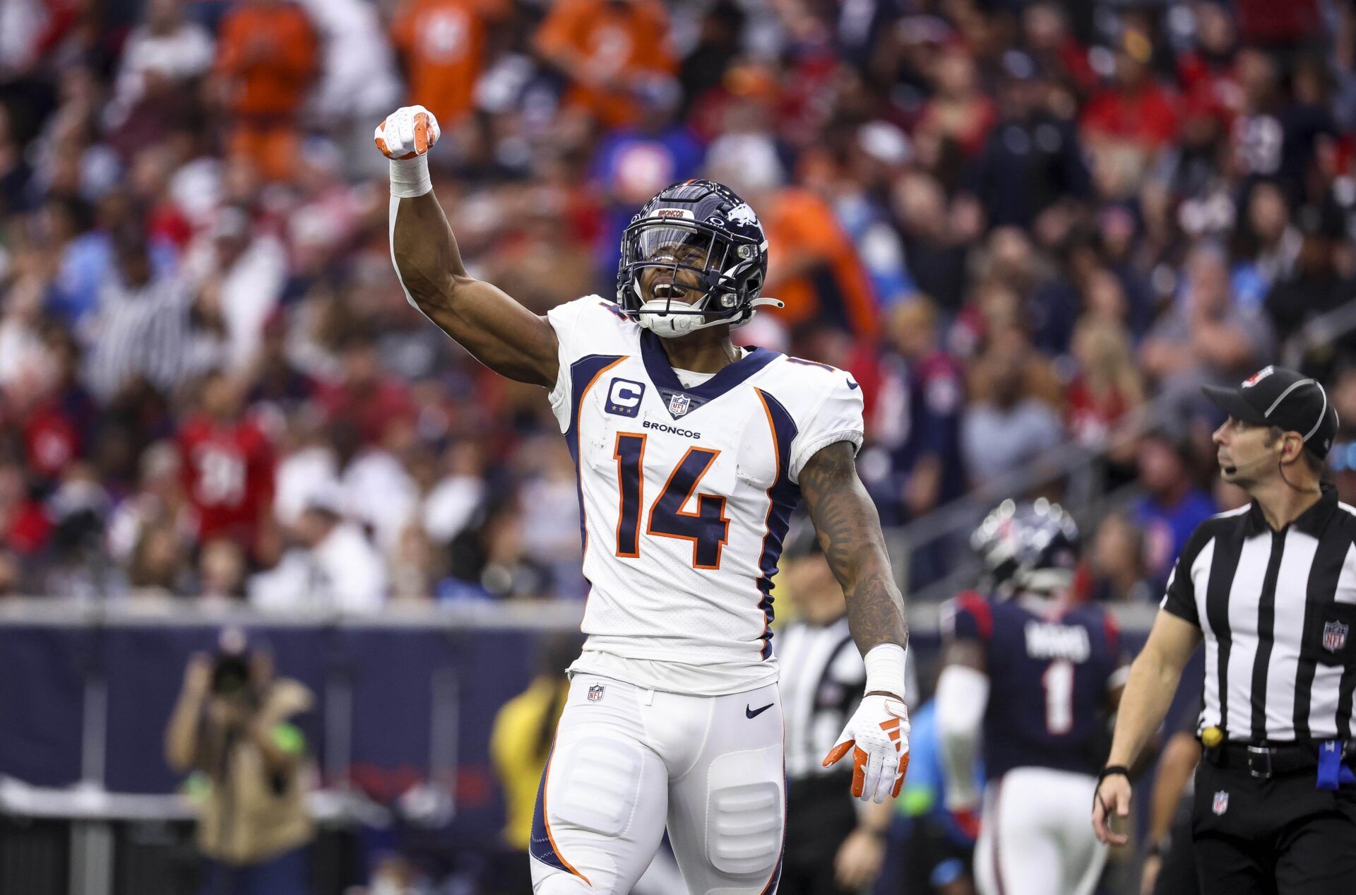 Denver Broncos wide receiver Courtland Sutton (14) reacts after scoring a touchdown during the third quarter against the Houston Texans at NRG Stadium. Mandatory Credit: Troy Taormina-USA TODAY Sports