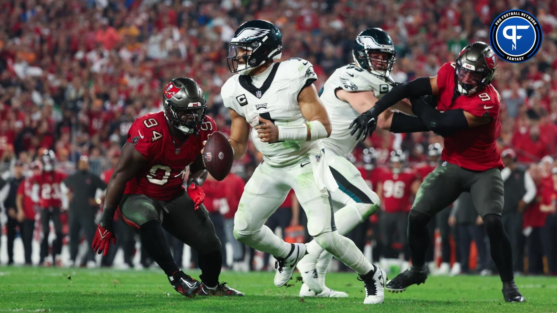 Philadelphia Eagles quarterback Jalen Hurts (1) scrambles with the ball against the Tampa Bay Buccaneers during the second half of a 2024 NFC wild card game at Raymond James Stadium. Does he go No. 1 in our dynasty mock draft?