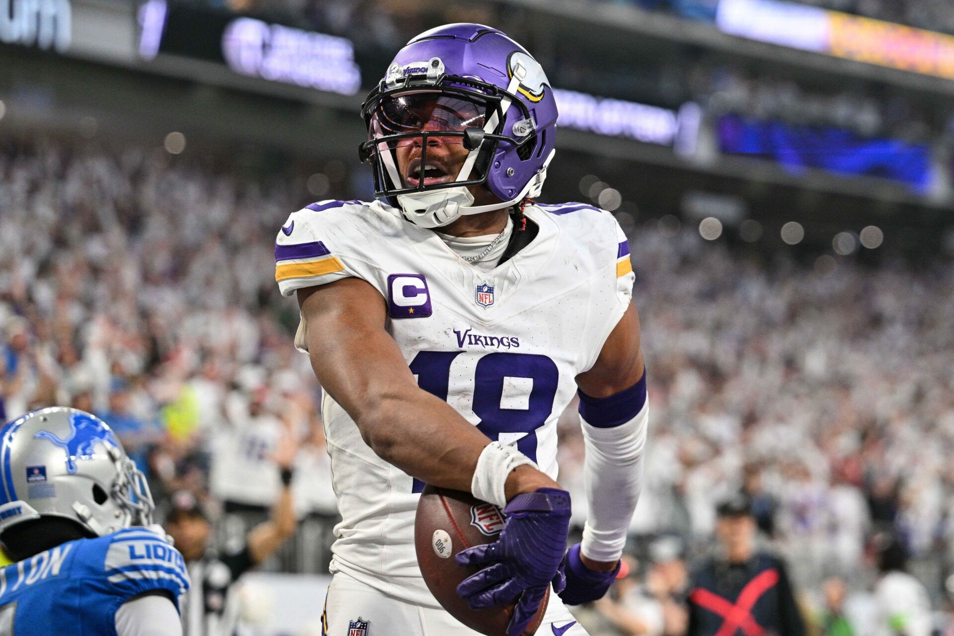 Minnesota Vikings wide receiver Justin Jefferson (18) reacts after scoring a touchdown during the second quarter against the Detroit Lions at U.S. Bank Stadium. Mandatory Credit: Jeffrey Becker-USA TODAY Sports