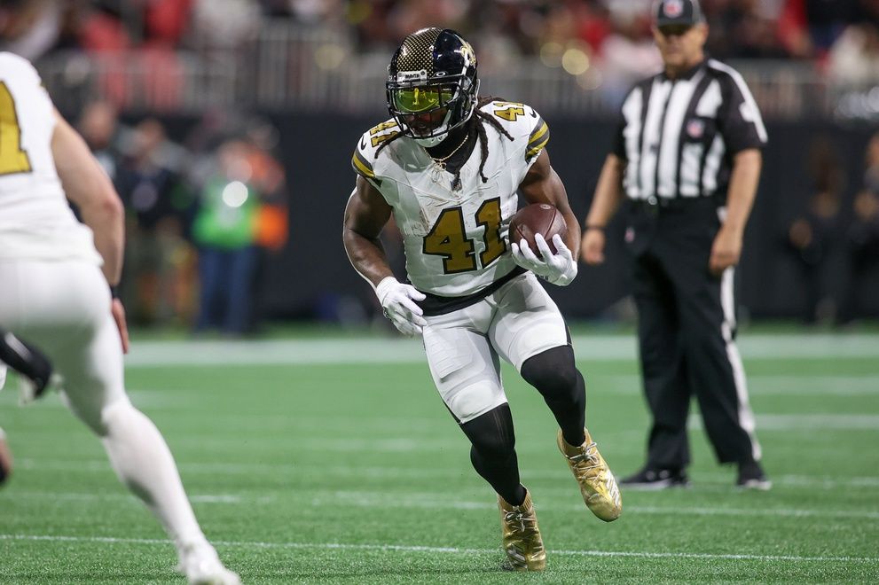 New Orleans Saints running back Alvin Kamara (41) runs the ball against the Atlanta Falcons in the first quarter at Mercedes-Benz Stadium. Mandatory Credit: Brett Davis-USA TODAY Sports