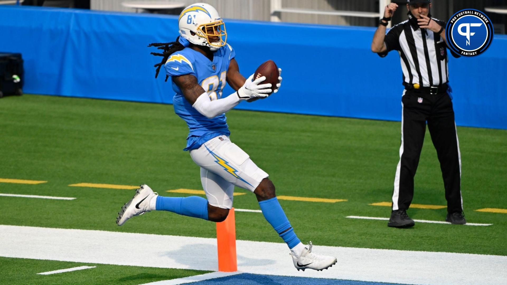 Los Angeles Chargers wide receiver Mike Williams (81) scores on a touchdown pass against the New York Jets in the first quarter at SoFi Stadium.