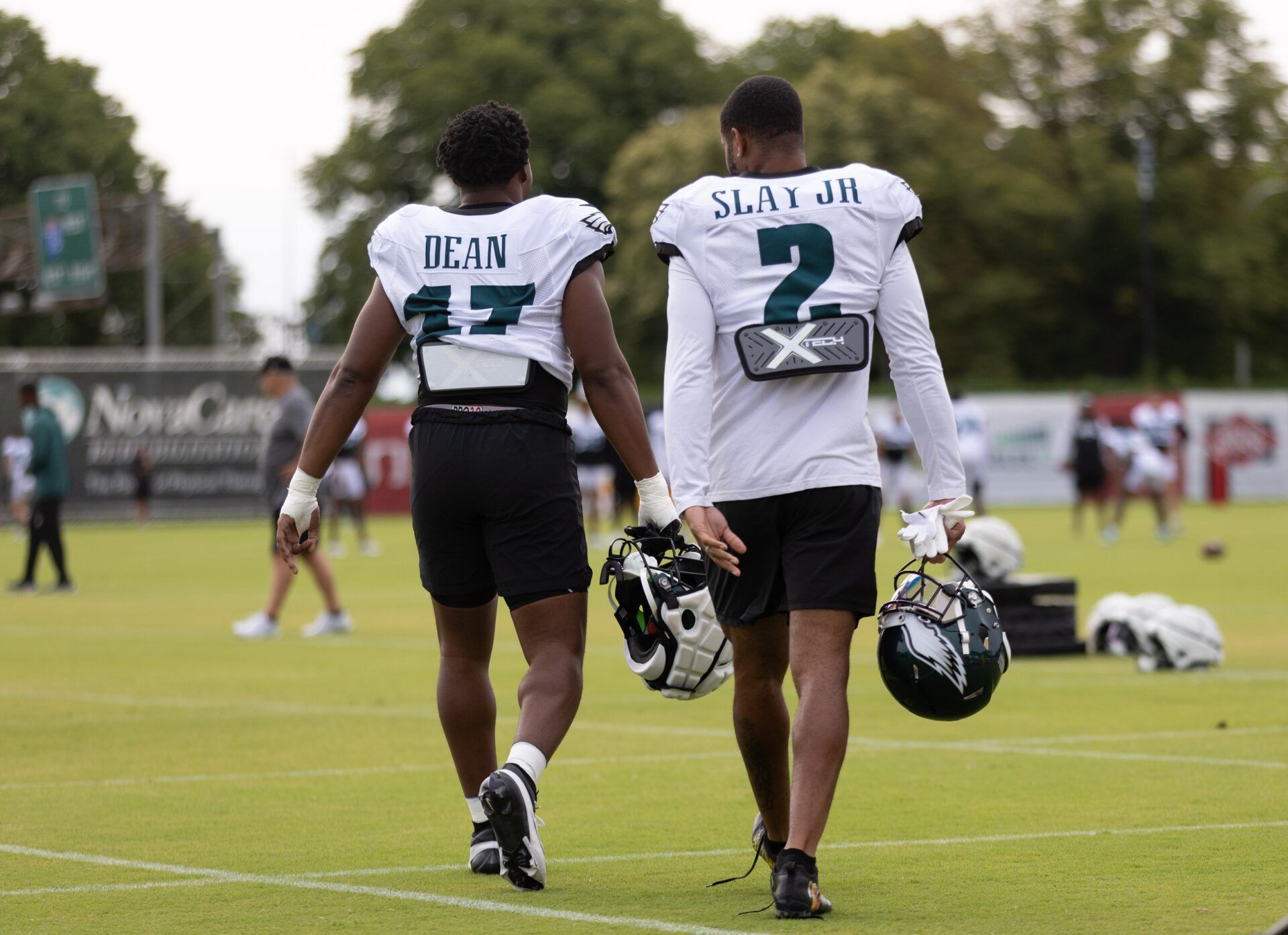 Philadelphia Eagles linebacker Nakobe Dean (17) and cornerback Darius Slay (2) during practice at Novacare Complex.