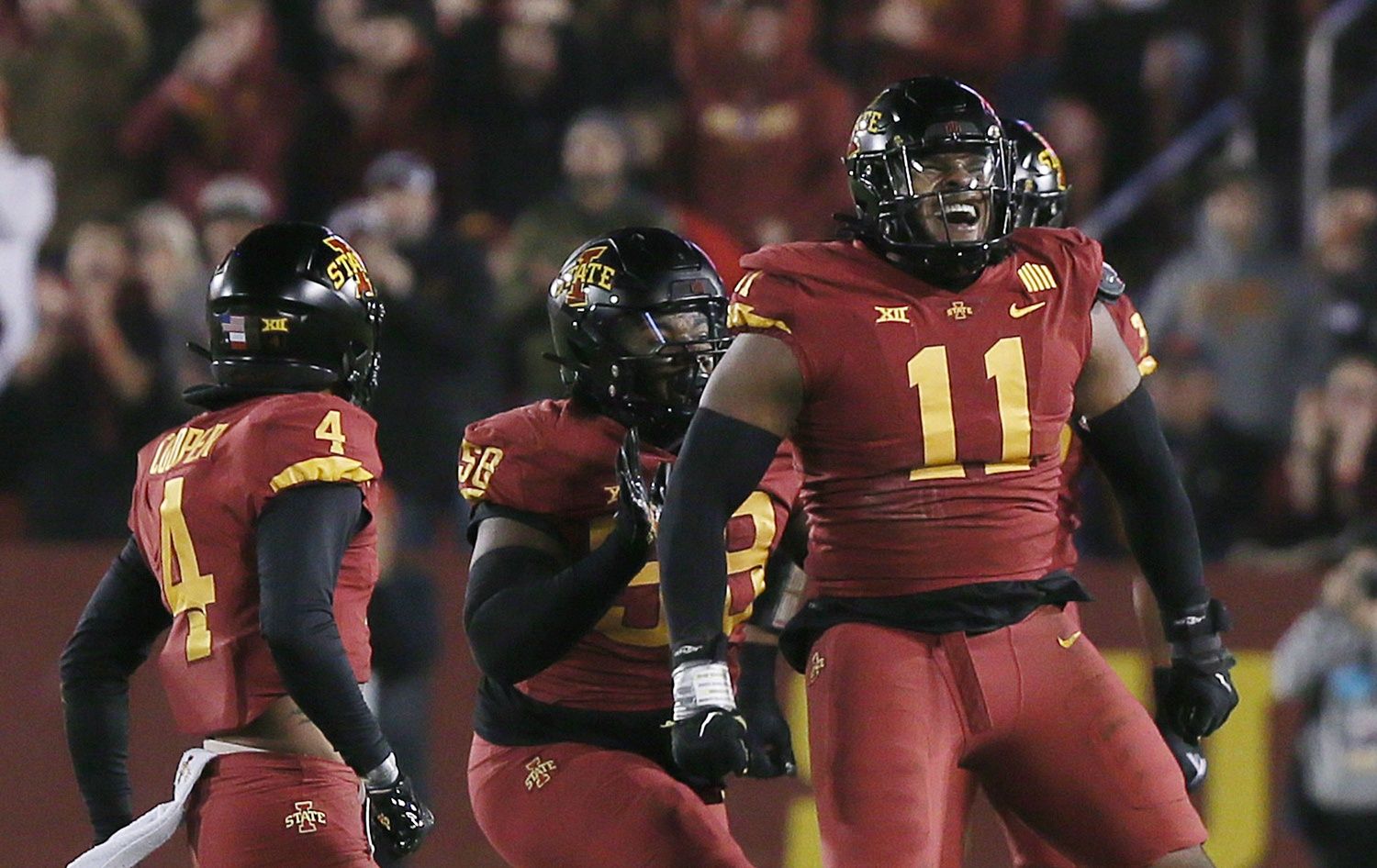 Iowa State Cyclones DT Tyler Onyedim (11) celebrates after a sack against the Texas Longhorns.