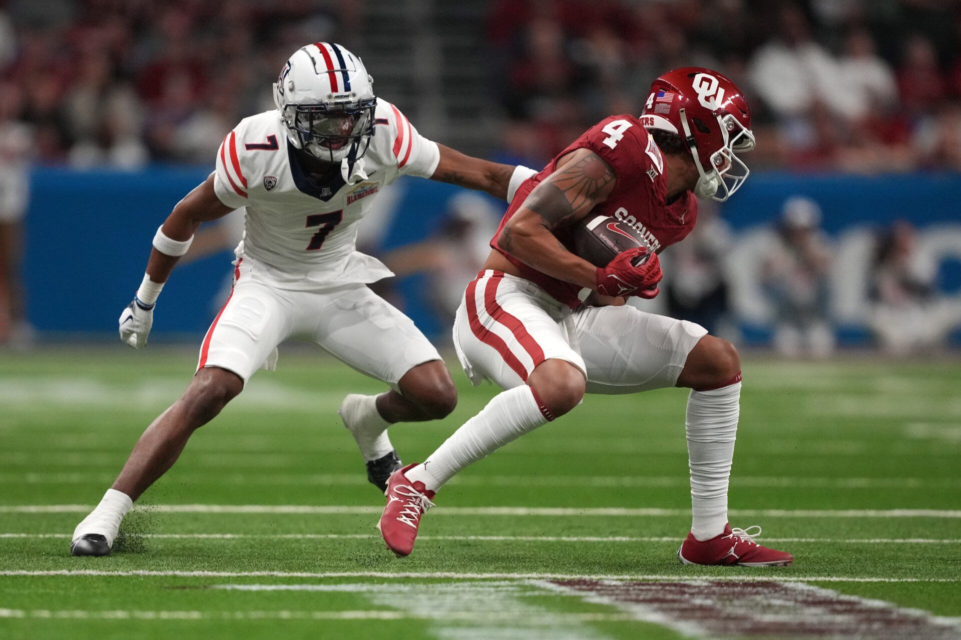 Oklahoma Sooners wide receiver Nic Anderson (4) catches the ball against Arizona Wildcats cornerback Ephesians Prysock (7) in the fist half of the Alamo Bowl at Alamodome. Mandatory Credit: Kirby Lee-USA TODAY Sports